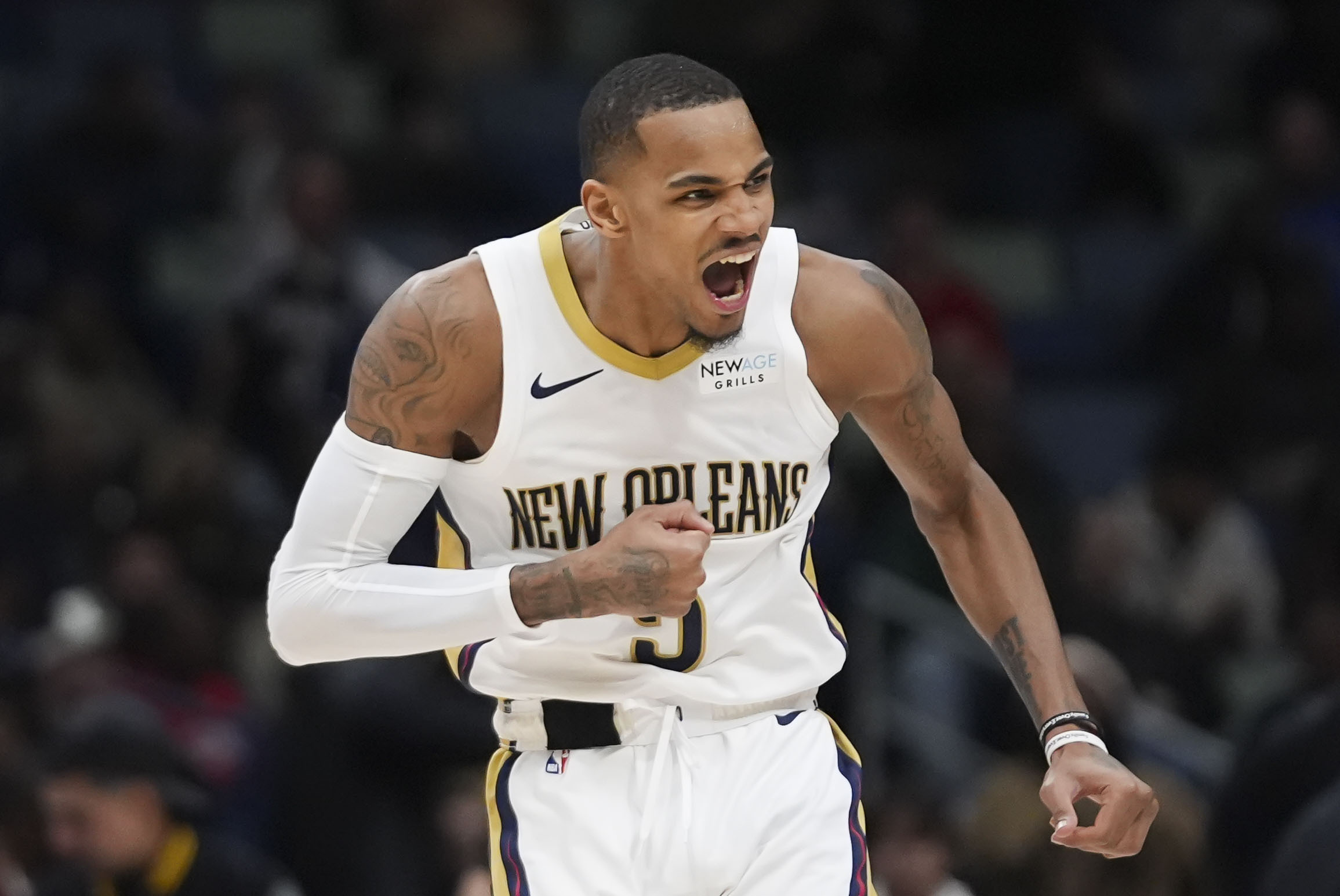 New Orleans Pelicans guard Dejounte Murray (5) reacts after making a basket in the second half of an NBA basketball game against the Dallas Mavericks in New Orleans, Wednesday, Jan. 15, 2025. The Pelicans won 119-116.