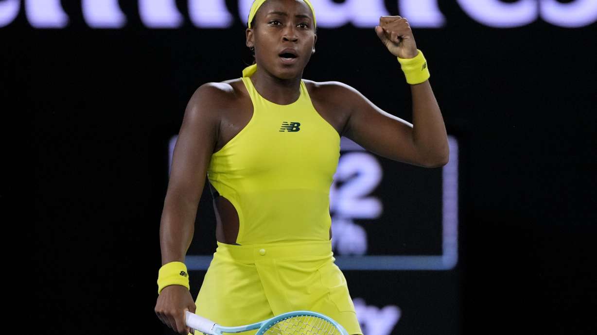 Coco Gauff of the U.S. reacts after defeating Jodie Burrage of Britain in their second round match at the Australian Open tennis championship in Melbourne, Australia, Wednesday, Jan. 15, 2025.