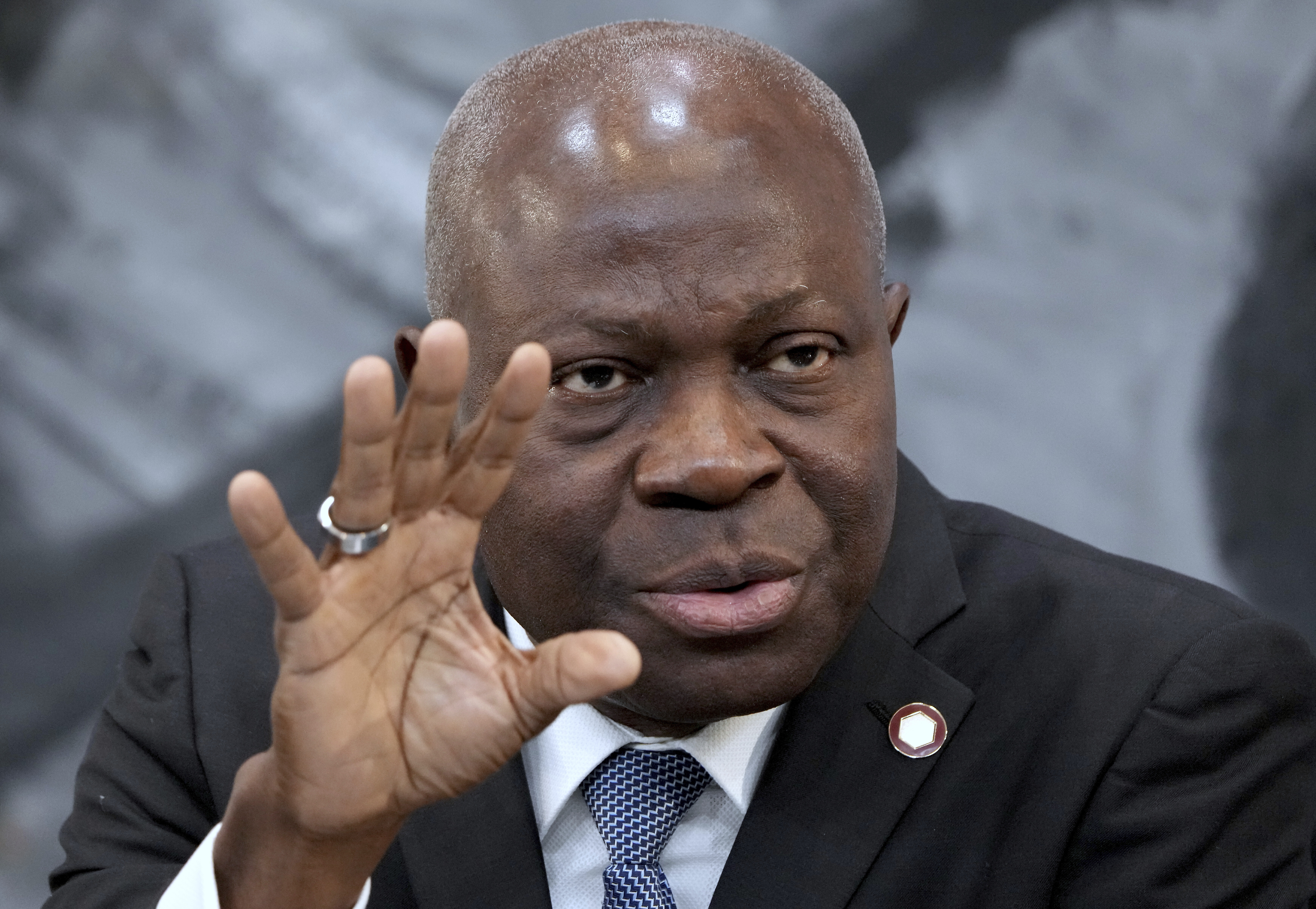FILE - Gilbert Houngbo, Director General of the International Labour Organization (ILO), addresses the media during a press conference in Berlin, Germany, Tuesday, Nov. 29, 2022.