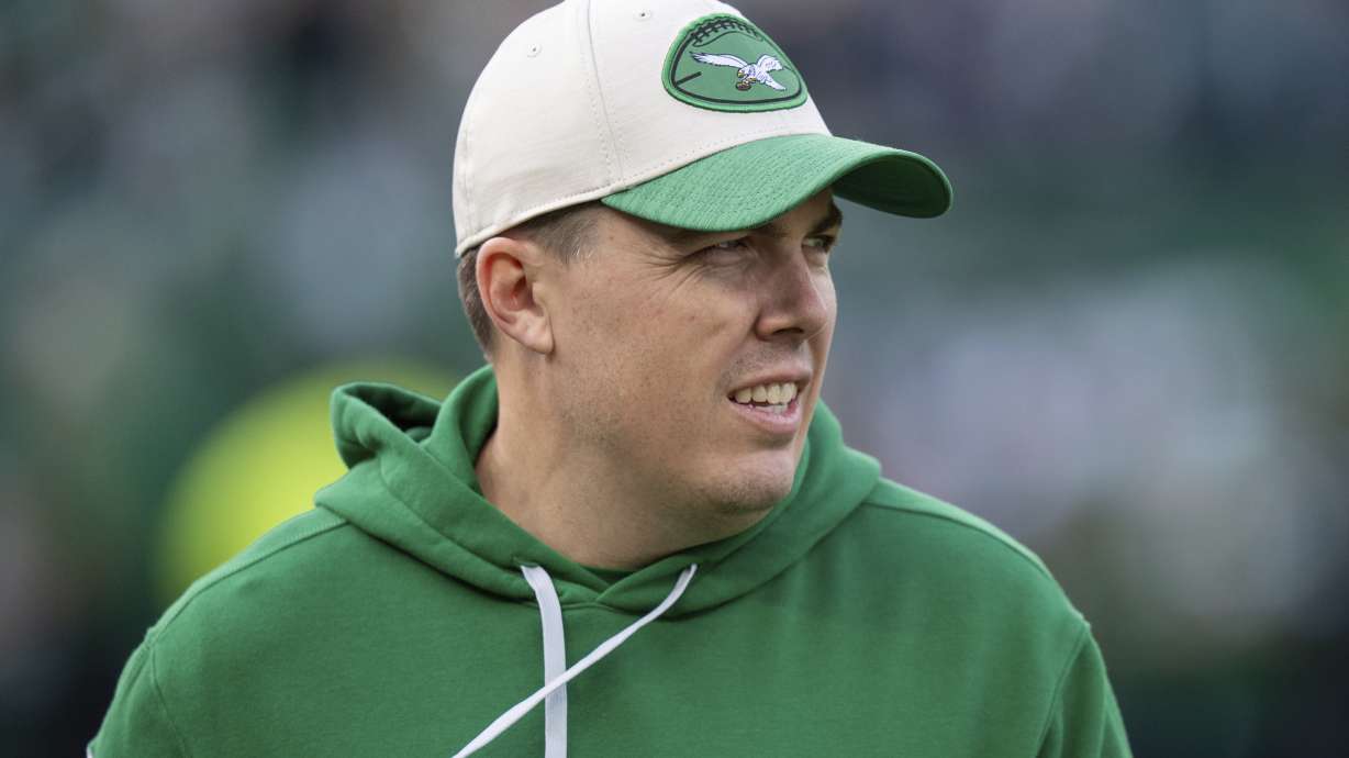 Philadelphia Eagle offensive coordinator Kellen Moore looks on during warm-ups prior to the NFL football game against the Dallas Cowboys, Dec. 29, 2024, in Philadelphia.