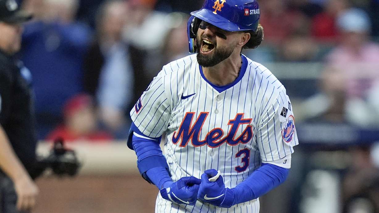 FILE - New York Mets' Jesse Winker (3) reacts after hitting a solo home run against the Philadelphia Phillies during the fourth inning of Game 3 of the National League baseball playoff series, Tuesday, Oct. 8, 2024, in New York.