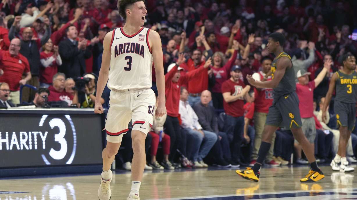 Arizona guard Anthony Dell'Orso reacts after scoring against Baylor during the first half of an NCAA college basketball game, Tuesday, Jan. 14, 2025, in Tucson, Ariz.
