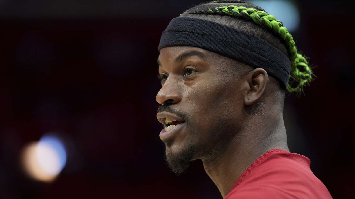 Miami Heat forward Jimmy Butler warms up on the court before an NBA basketball game against the Indiana Pacers Thursday, Jan. 2, 2025, in Miami.