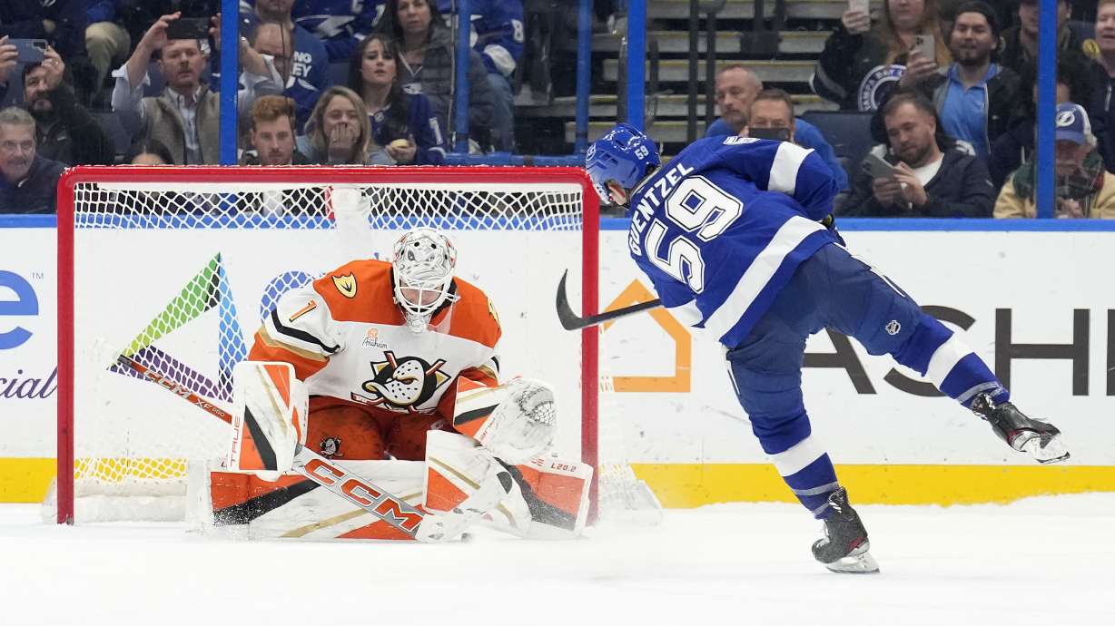 Tampa Bay Lightning center Jake Guentzel (59) scores past Anaheim Ducks goaltender Lukas Dostal (1) during a shootout in an NHL hockey game Thursday, Jan. 16, 2025, in Tampa, Fla.