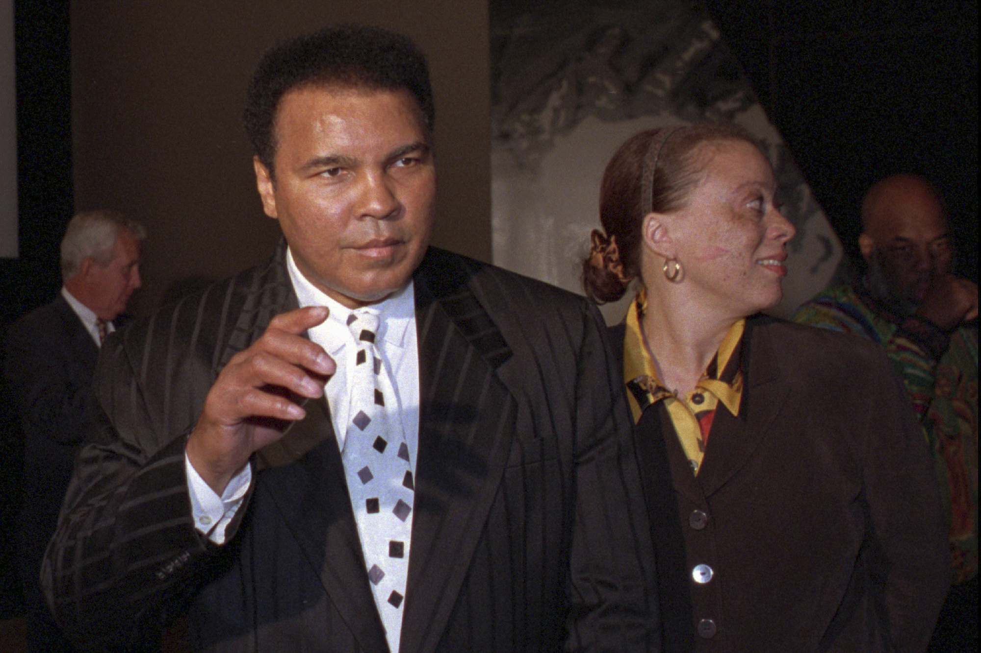 FILE - Muhammad Ali and his wife, Lonnie appear at a premiere for "When We Were Kings" in Louisville, Ky., on Feb. 27, 1997.