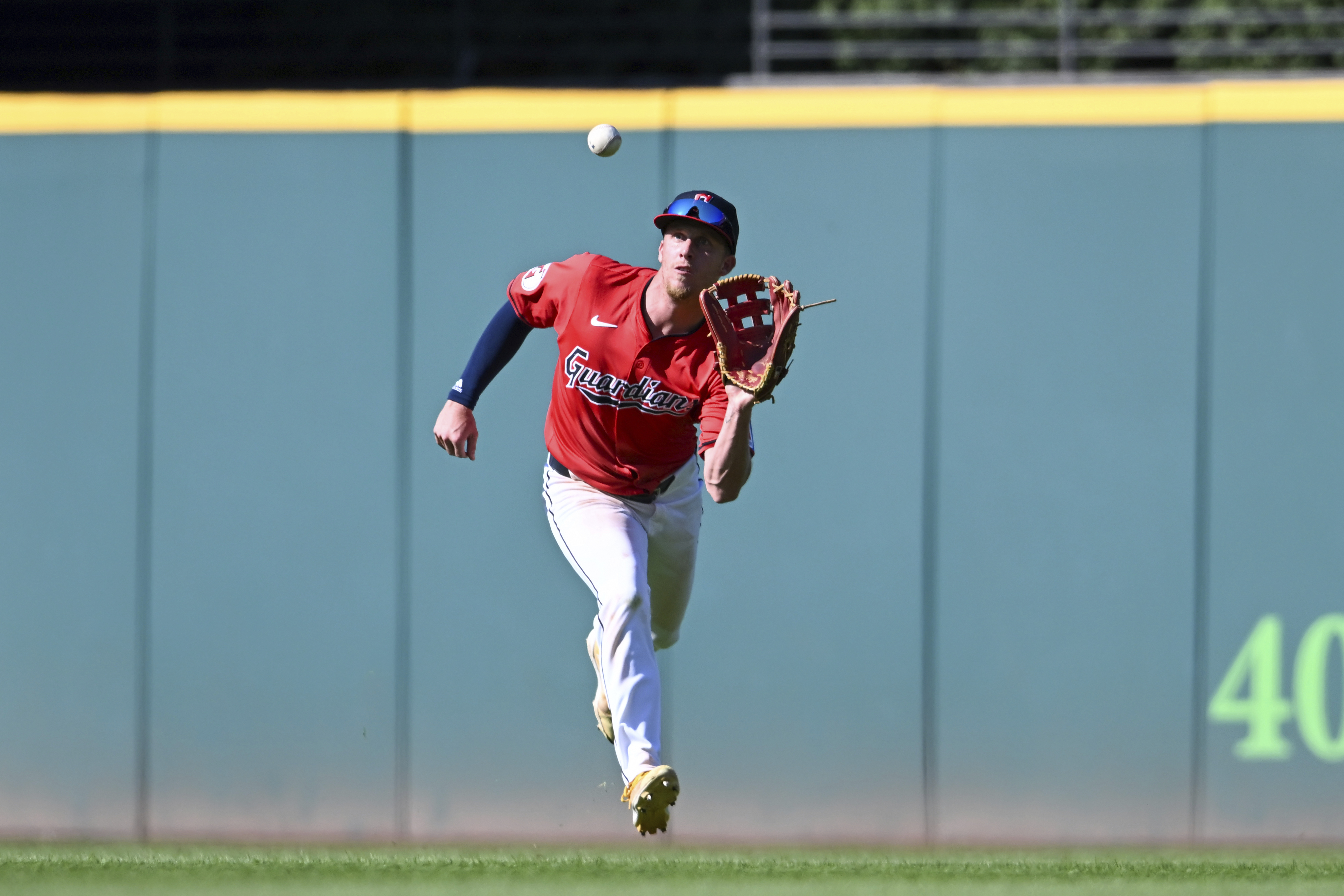 FILE - Cleveland Guardians' Myles Straw catches a fly ball during the ninth inning of a baseball game against the Minnesota Twins, Thursday, Sept. 19, 2024, in Cleveland.