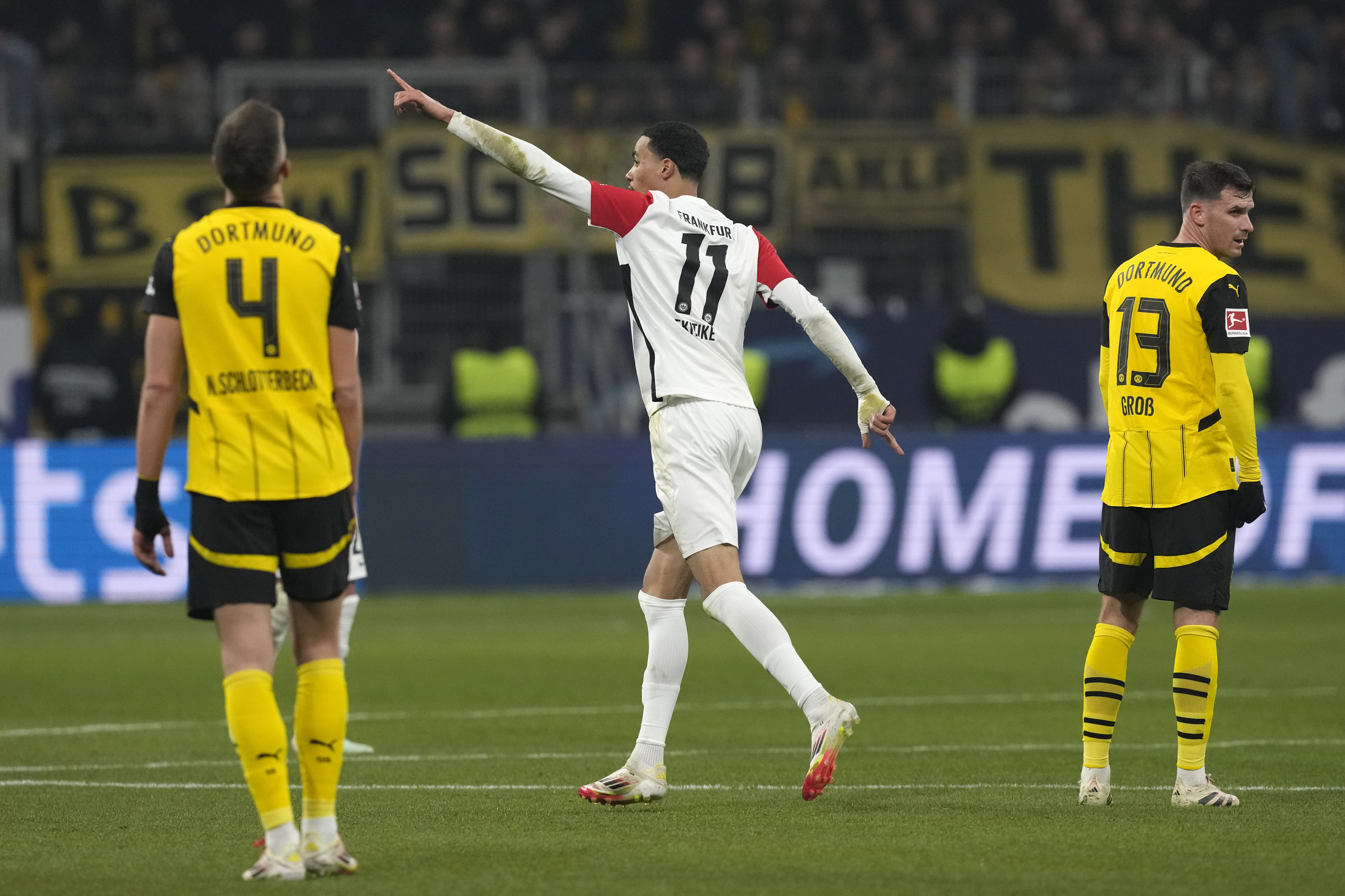 Frankfurt's Hugo Ekitike celebrates after scoring his sides first goal during the German Bundesliga soccer match between Eintracht Frankfurt and Borussia Dortmund in Frankfurt, Germany, Friday, Jan. 17, 2025.