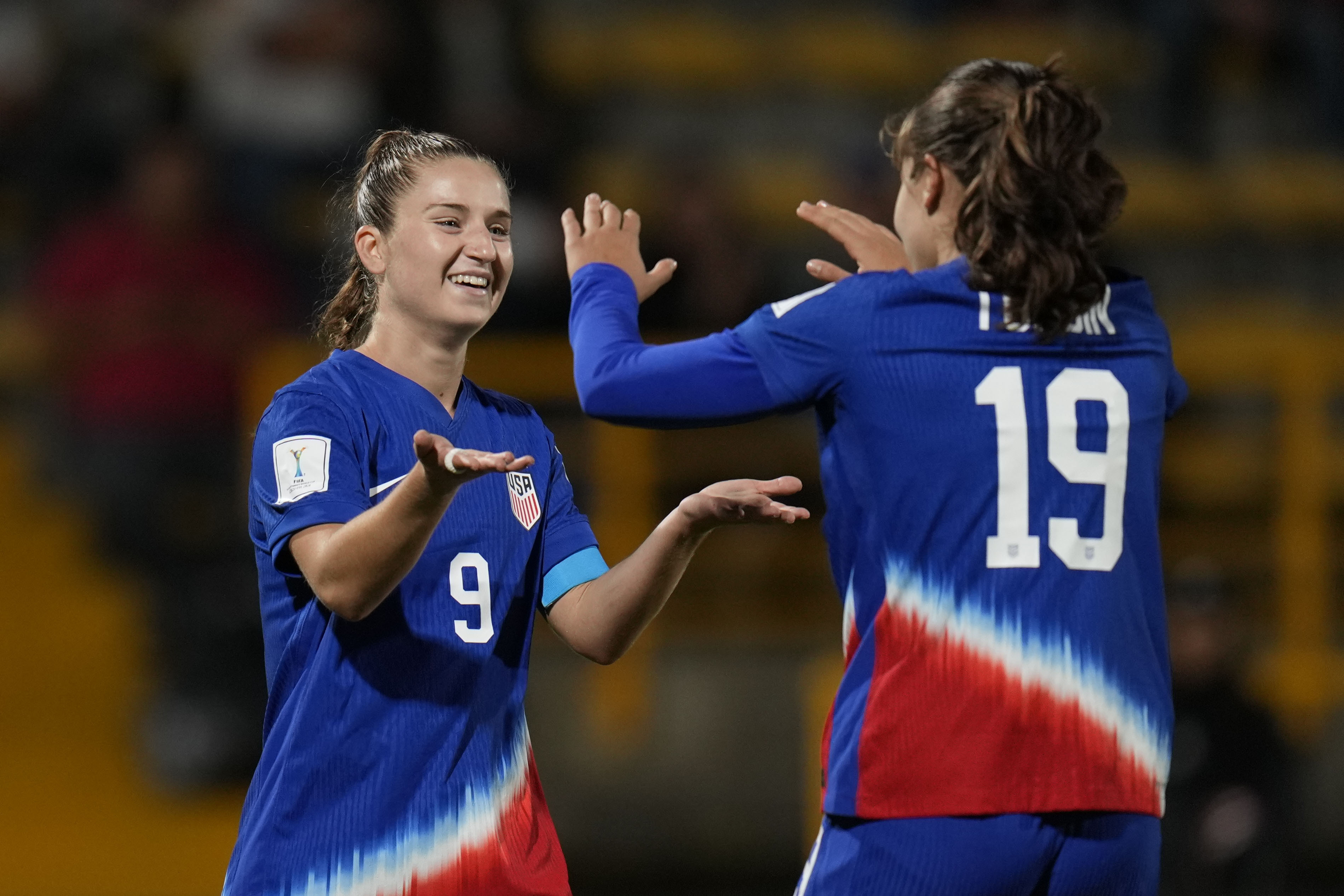 United States' Ally Sentnor, left, celebrates scoring her side's fifth goal against Paraguay during a U-20 Women's World Cup soccer match in Bogota, Colombia, Saturday, Sept. 7, 2024.