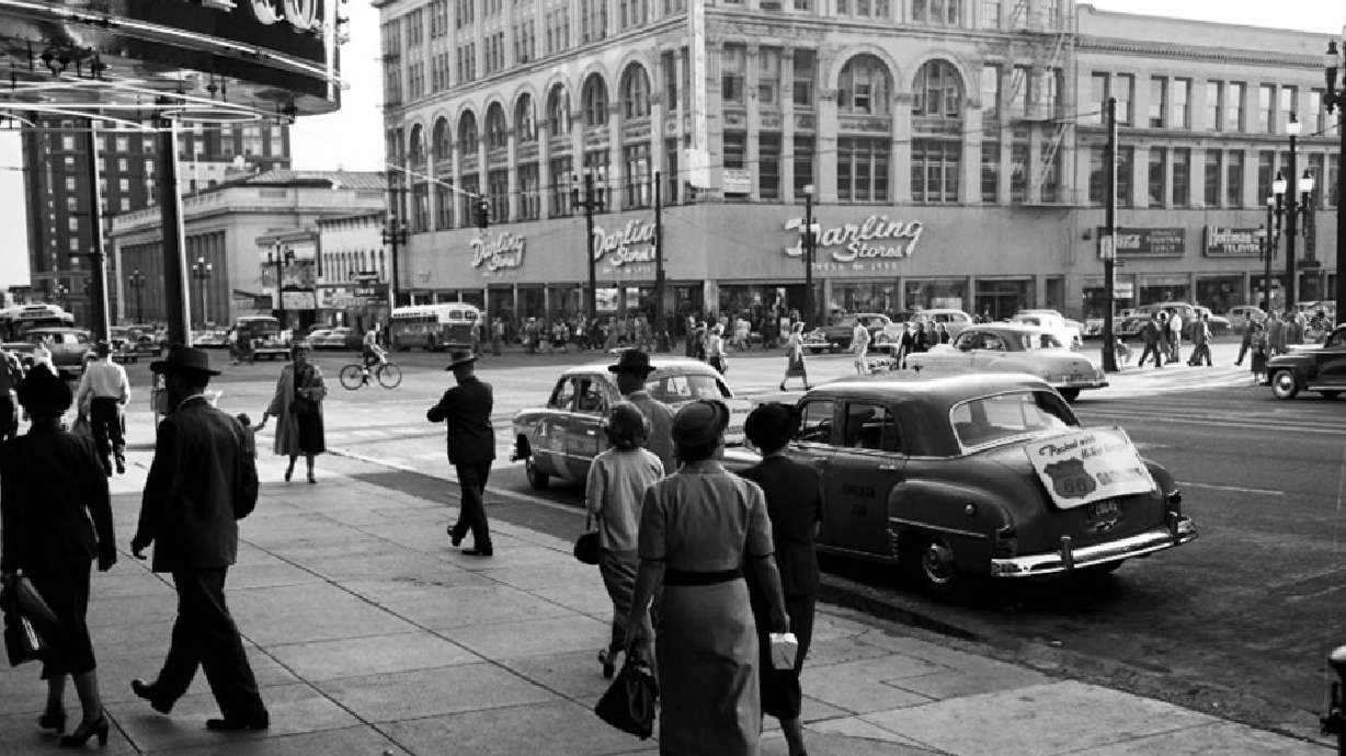 People walk through downtown Salt Lake City on Oct. 3, 1951. The city launched a new program to place plaques and signs at specific sites that highlight a significant historical event, person or place in the city, but it's still looking for help identifying sites.