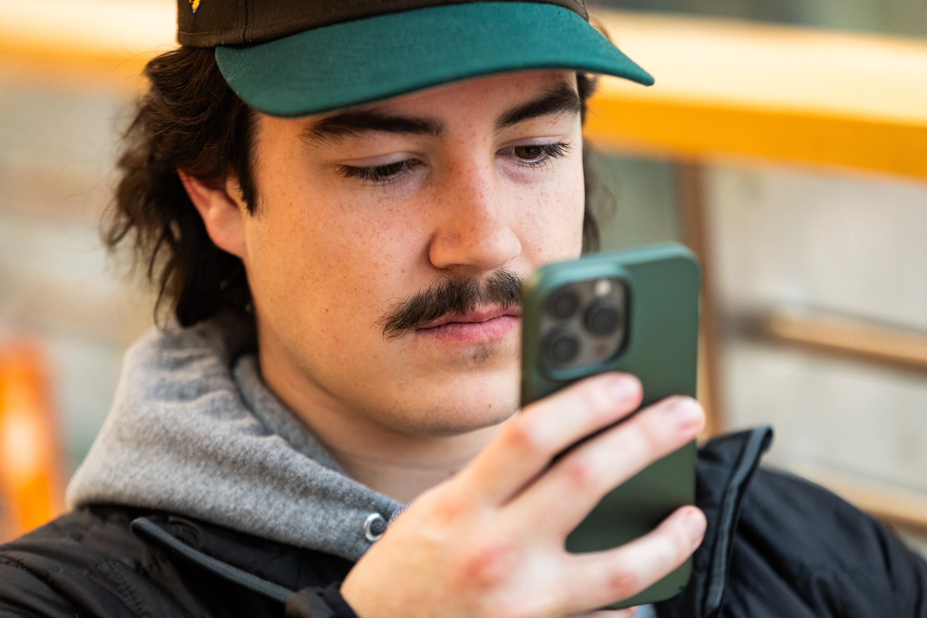 University of Utah freshman Finn Melchir demonstrates scrolling through videos on TikTok at the University Union at the University of Utah in Salt Lake City on Friday.