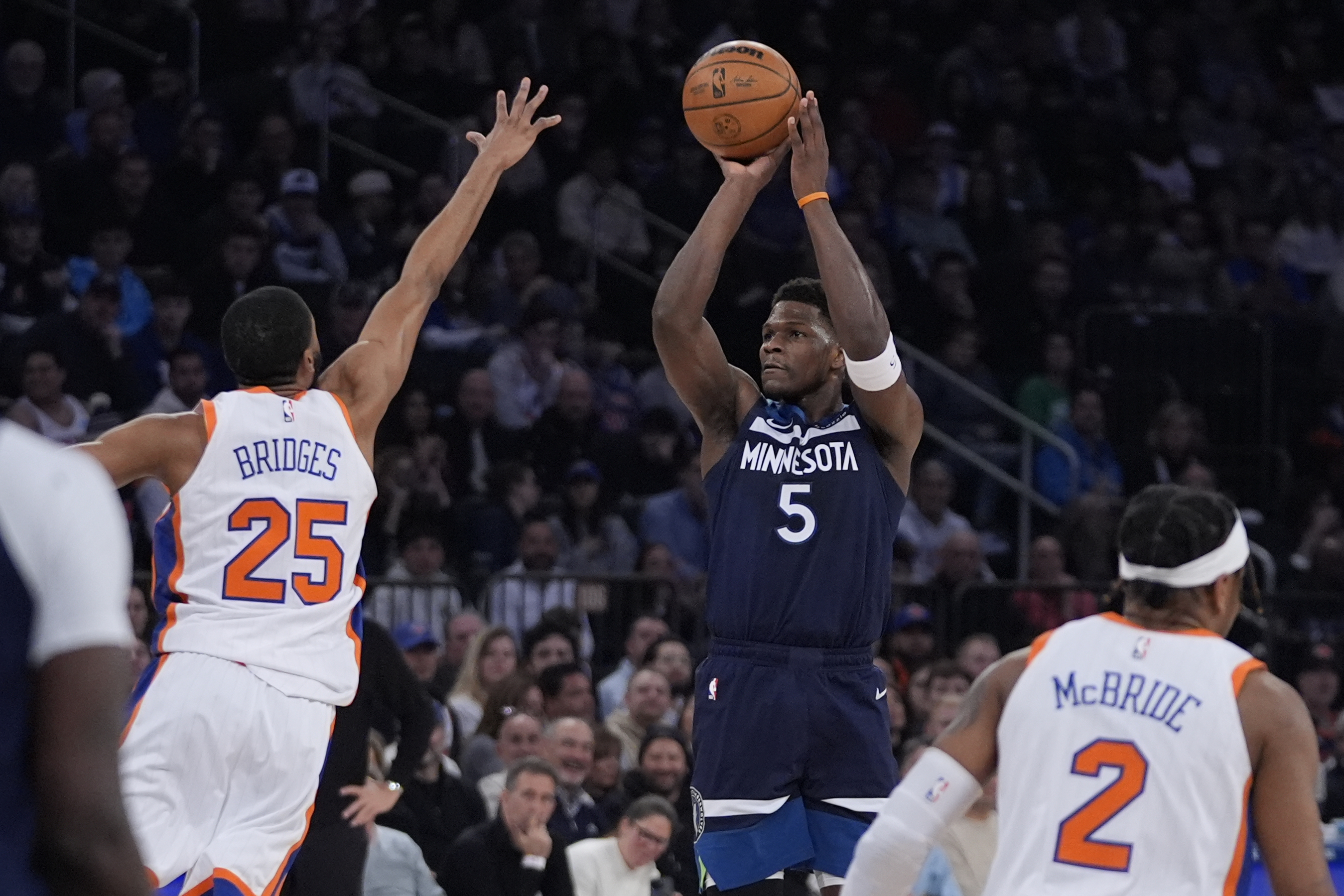Minnesota Timberwolves' Anthony Edwards (5) shoots over New York Knicks' Mikal Bridges (25) during the first half of an NBA basketball game Friday, Jan. 17, 2025, in New York.