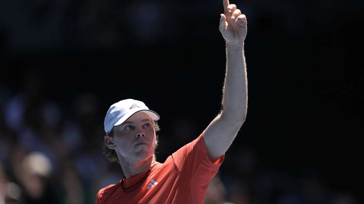 Alex Michelsen of the U.S. gestures during his third round match against Karen Khachanov of Russia at the Australian Open tennis championship in Melbourne, Australia, Saturday, Jan. 18, 2025.