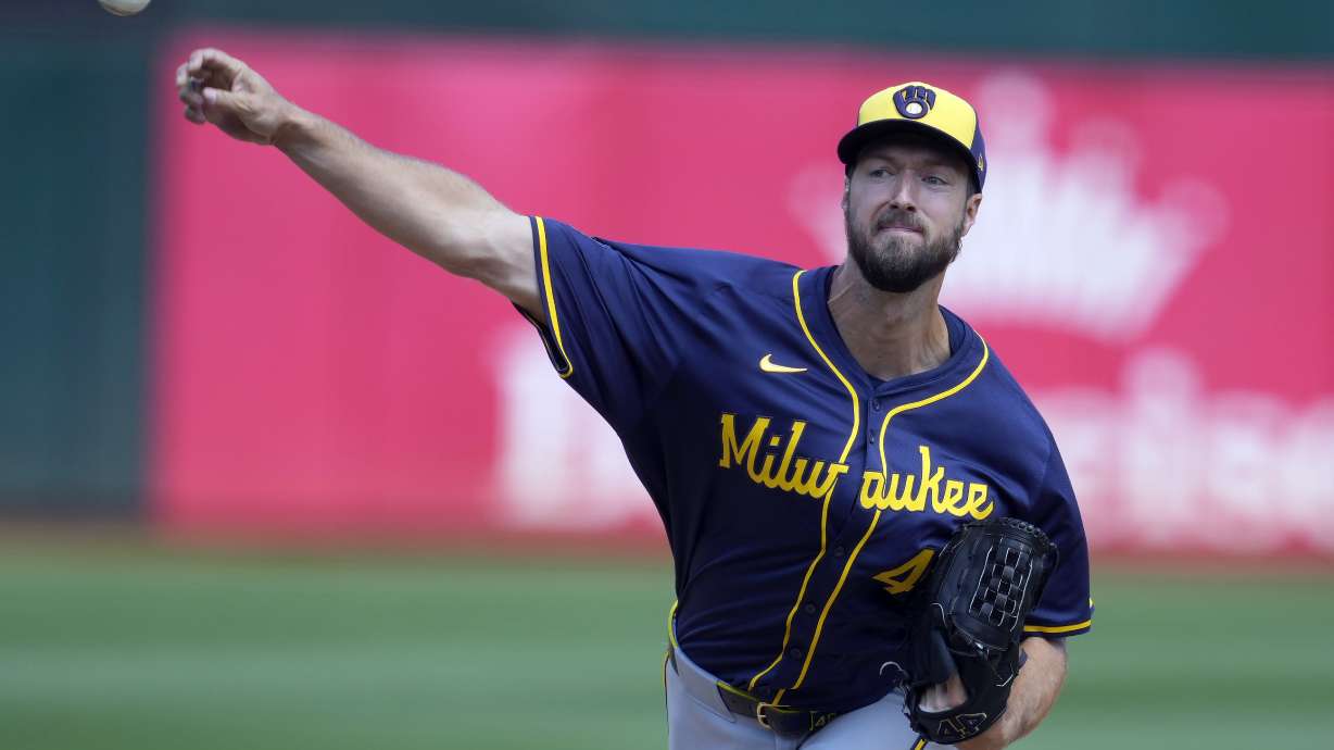 FILE - Milwaukee Brewers pitcher Colin Rea throws during a baseball game against the Oakland Athletics in Oakland, Calif., Saturday, Aug. 24, 2024.