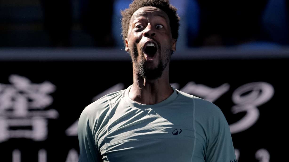 Gael Monfils of France celebrates after defeating Taylor Fritz of the U.S. in their third round match at the Australian Open tennis championship in Melbourne, Australia, Saturday, Jan. 18, 2025.