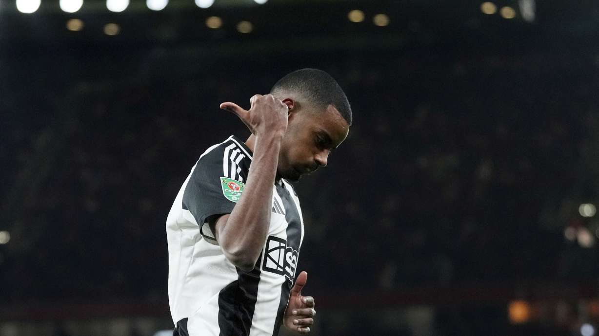 Newcastle's Alexander Isak celebrates after scoring the opening goal during the English League Cup semifinal first leg soccer match between Arsenal and Newcastle United at the Emirates stadium in London, Tuesday, Jan. 7, 2025.