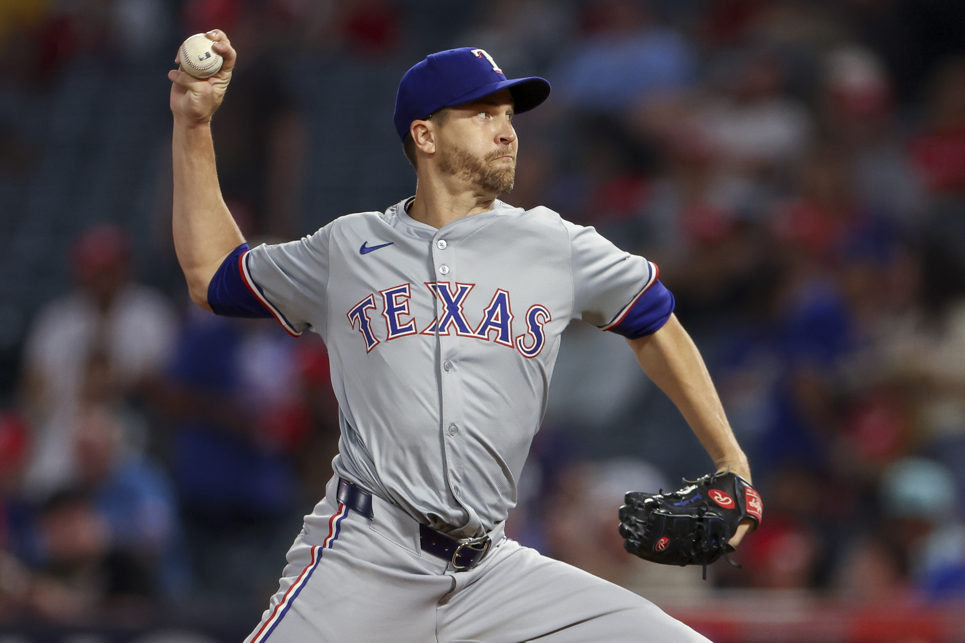 FILE - Texas Rangers starting pitcher Jacob deGrom throws during the first inning of a baseball game against the Los Angeles Angels, Friday, Sept. 27, 2024, in Anaheim, Calif.