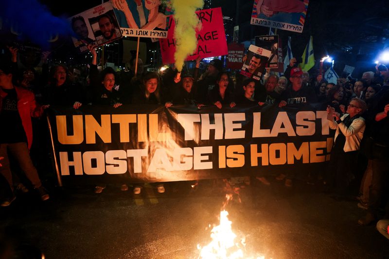 Families and supporters of the Israeli hostages kidnapped during the deadly Oct. 7, 2023, attack by Hamas demonstrate in support of the ceasefire deal between Israel and Hamas, the day before it goes into effect, in Tel Aviv, Israel, Saturday.