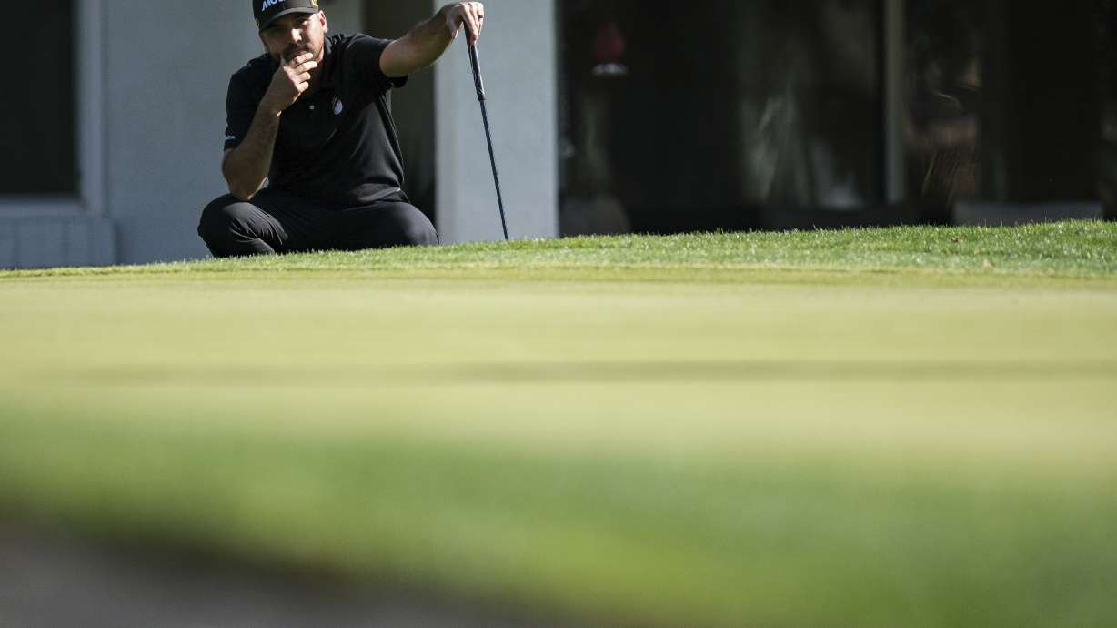 Jason Day waits to putt on the fourth green at La Quinta Country Club Course during the first round of the American Express golf tournament in La Quinta, Calif., Thursday, Jan. 16, 2025.