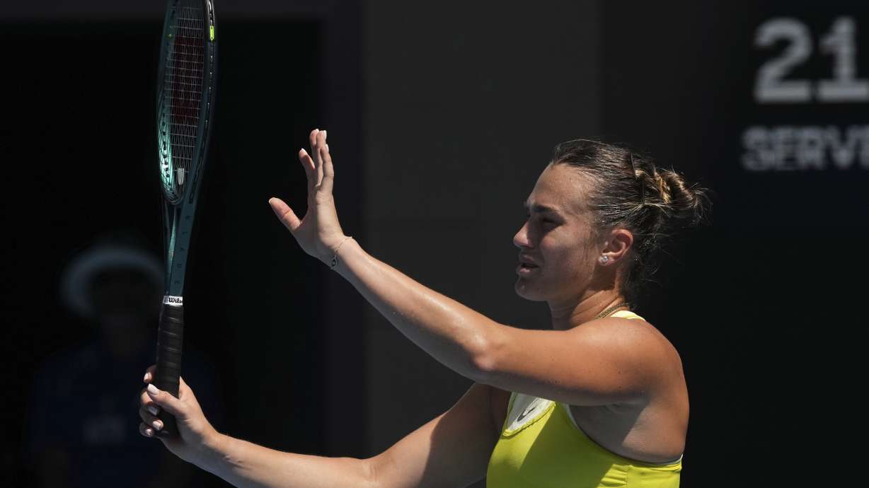 Aryna Sabalenka of Belarus reacts during a fourth round match against Mirra Andreeva of Russia at the Australian Open tennis championship in Melbourne, Australia, Sunday, Jan. 19, 2025.