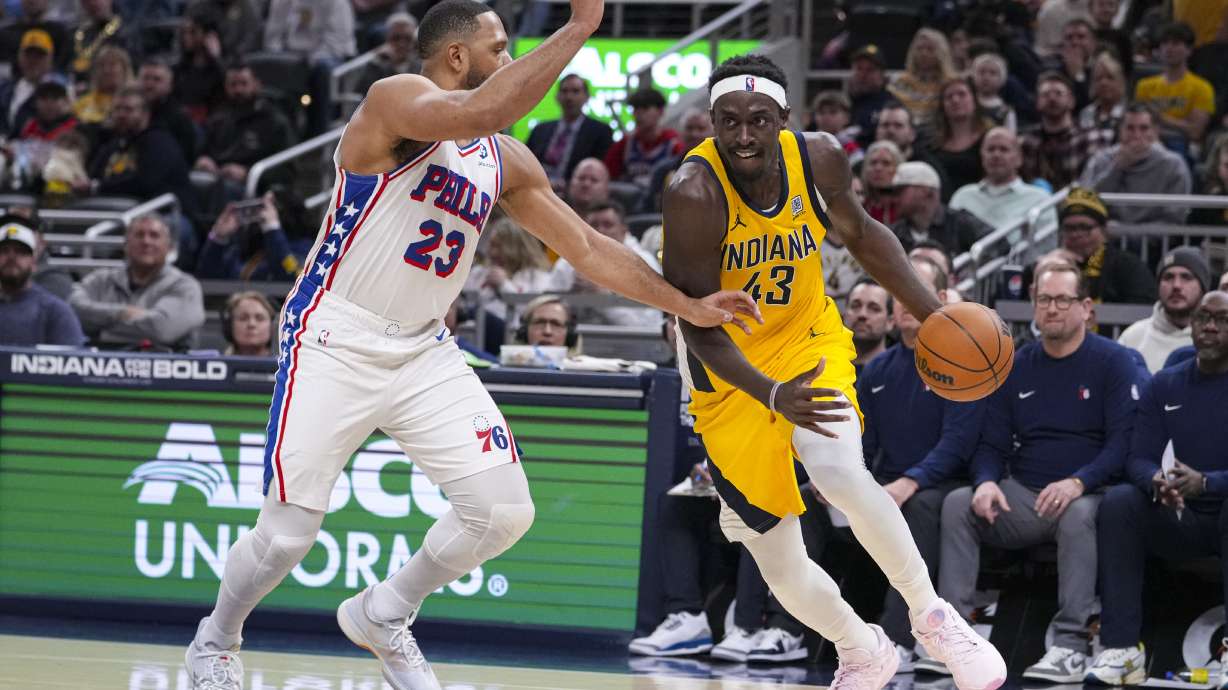 Indiana Pacers forward Pascal Siakam (43) drives on Philadelphia 76ers guard Eric Gordon (23) during the second half of an NBA basketball game in Indianapolis, Saturday, Jan. 18, 2025.