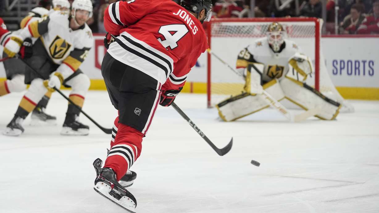 Chicago Blackhawks defenseman Seth Jones (4) scores against Vegas Golden Knights goaltender Ilya Samsonov (35) during the second period of an NHL hockey game Saturday, Jan. 18, 2025, in Chicago.
