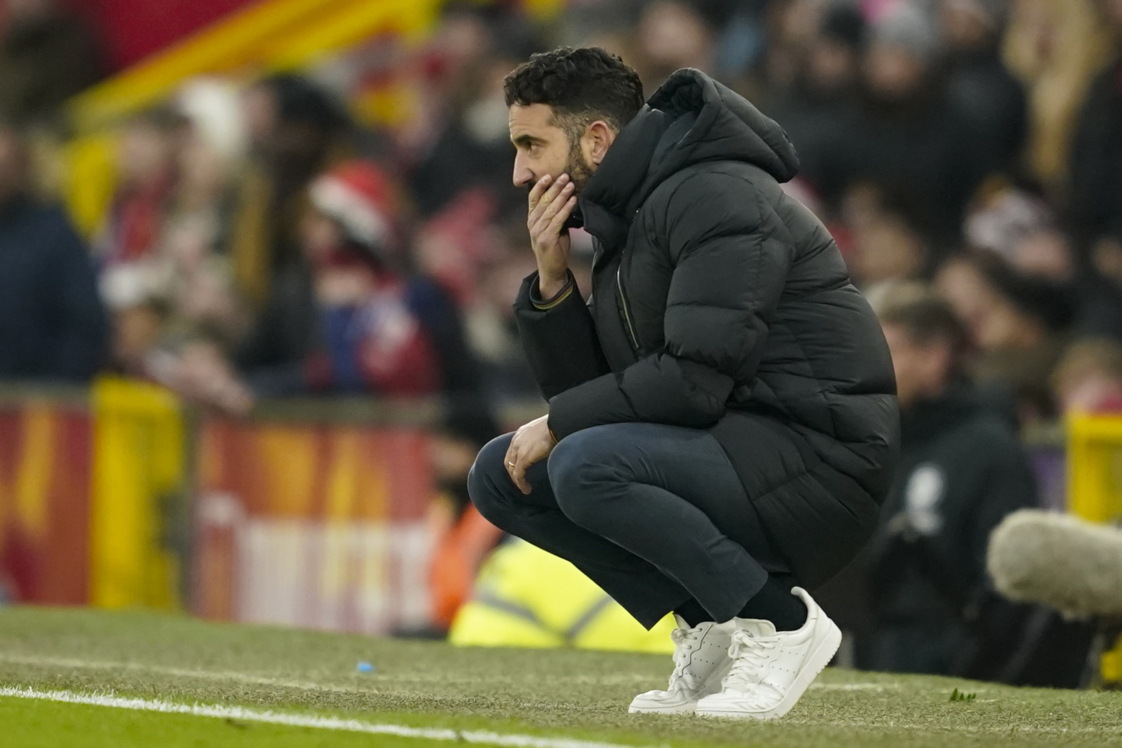 Manchester United's head coach Ruben Amorim follows the game during the English Premier League soccer match between Manchester United and Brighton and Hove Albion, at the Old Trafford stadium in Manchester, England, Sunday, Jan. 19, 2025.