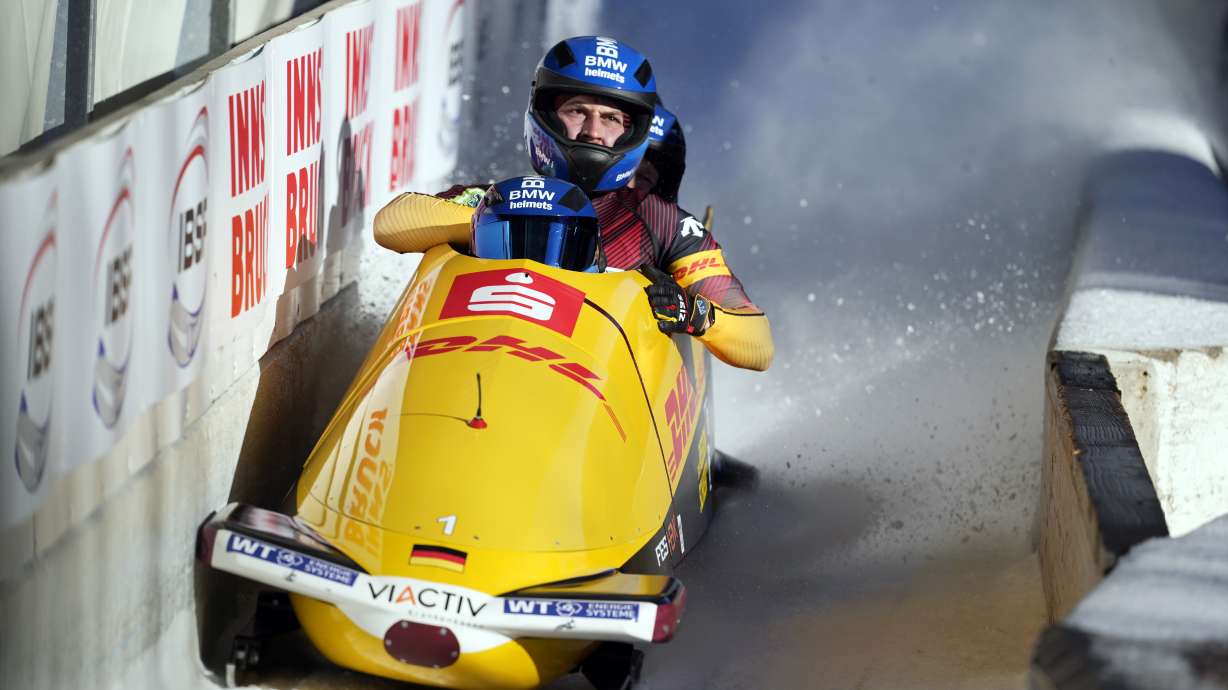Francesco Friedrich, Matthias Sommer, Alexander Schueller and Felix Straub, of Germany, finish their second run in the 4-man bobsleigh at the Bobsleigh World Cup in Innsbruck, Austria, Sunday, Jan. 19, 2025.