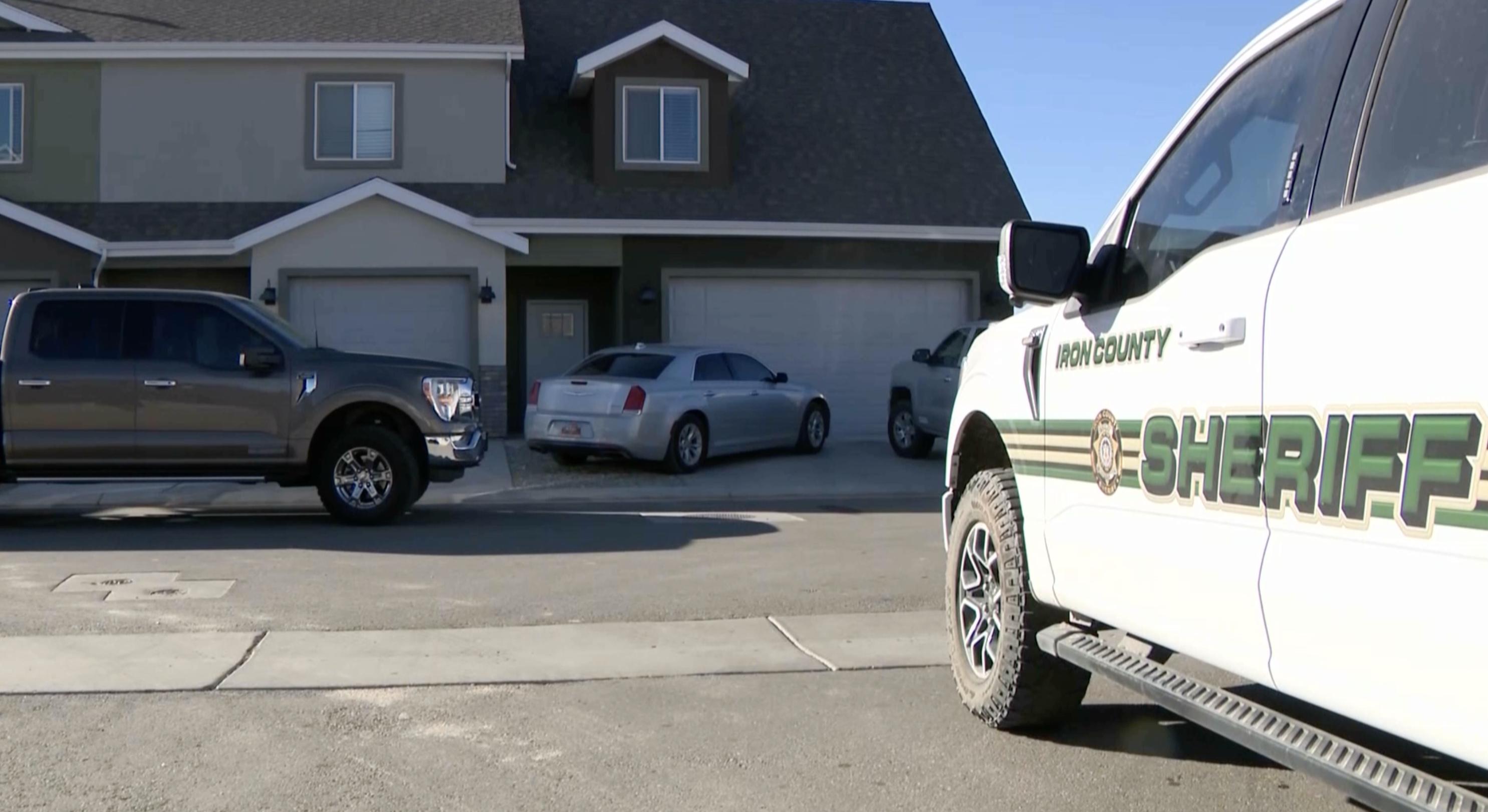 Investigators from the Iron County Sheriff's Office search the residence of the suspects believed to be involved in the shooting and killing of a 17-year-old driver near Cedar City on Jan. 17.