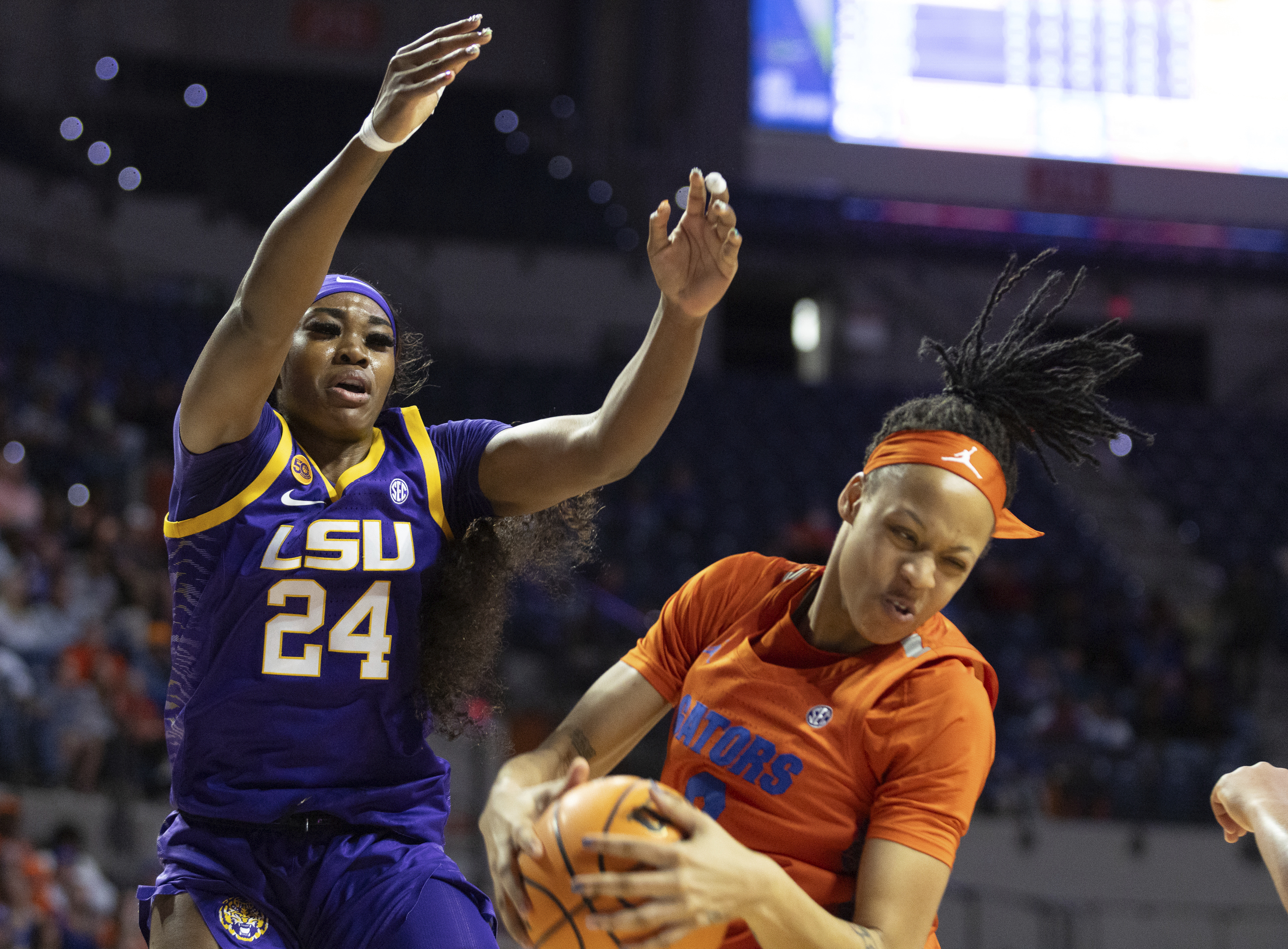 Florida guard Me'Arah O'Neal, right, rebounds past LSU guard Aneesah Morrow (24) during the first half an NCAA college basketball game Sunday, Jan. 19, 2025, in Gainesville, Fla.