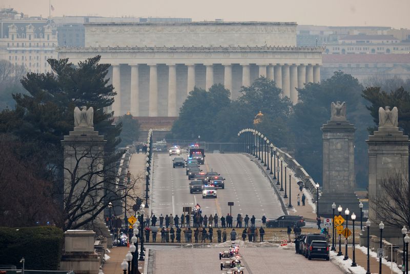 A motorcade transporting the U.S. Vice President-elect JD Vance arrives at Arlington National Cemetery on the day President-elect Donald Trump attended a wreath laying ceremony ahead of the presidential inauguration, in Arlington, Va., Sunday.