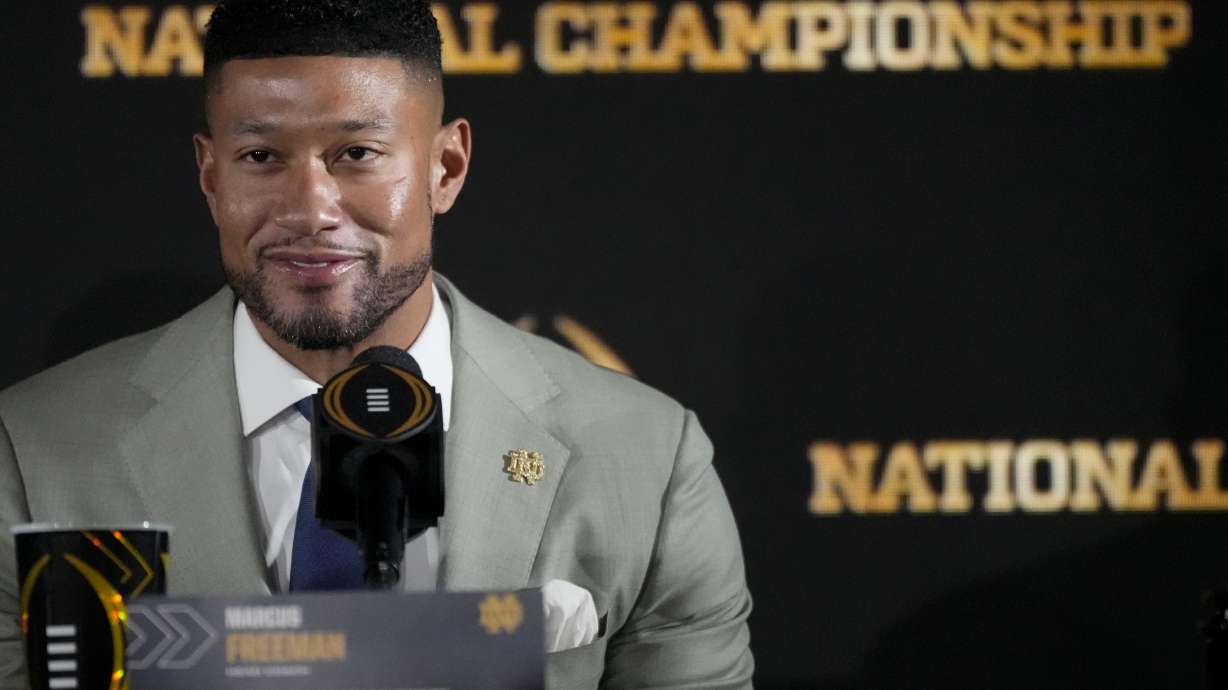 Notre Dame head coach Marcus Freeman speaks during a news conference ahead of the College Football Playoff national championship game Sunday, Jan. 19, 2025, in Atlanta. The game between Ohio State and Notre Dame will be played on Monday.