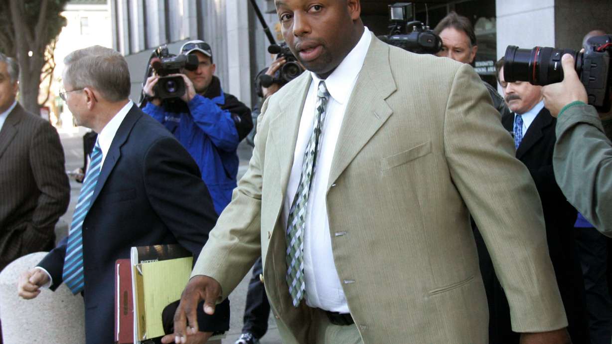 FILE - Former NFL football player Dana Stubblefield leaves a federal courthouse in San Francisco, Jan. 18, 2008.