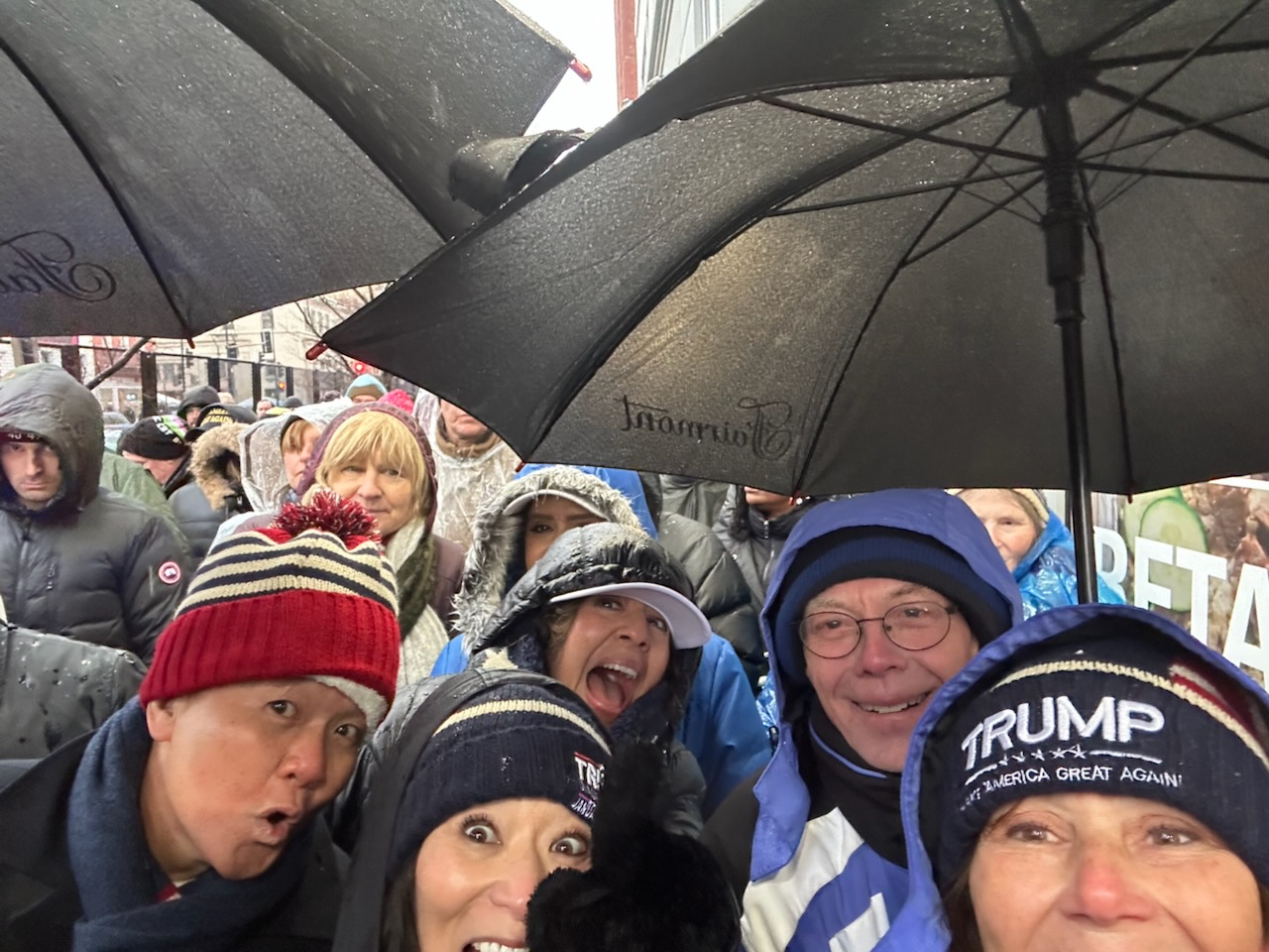 Joy Petro, right, Kerry Wright, Tamara Tran and others pose for a selfie outside Capital One Arena in Washington, Sunday.