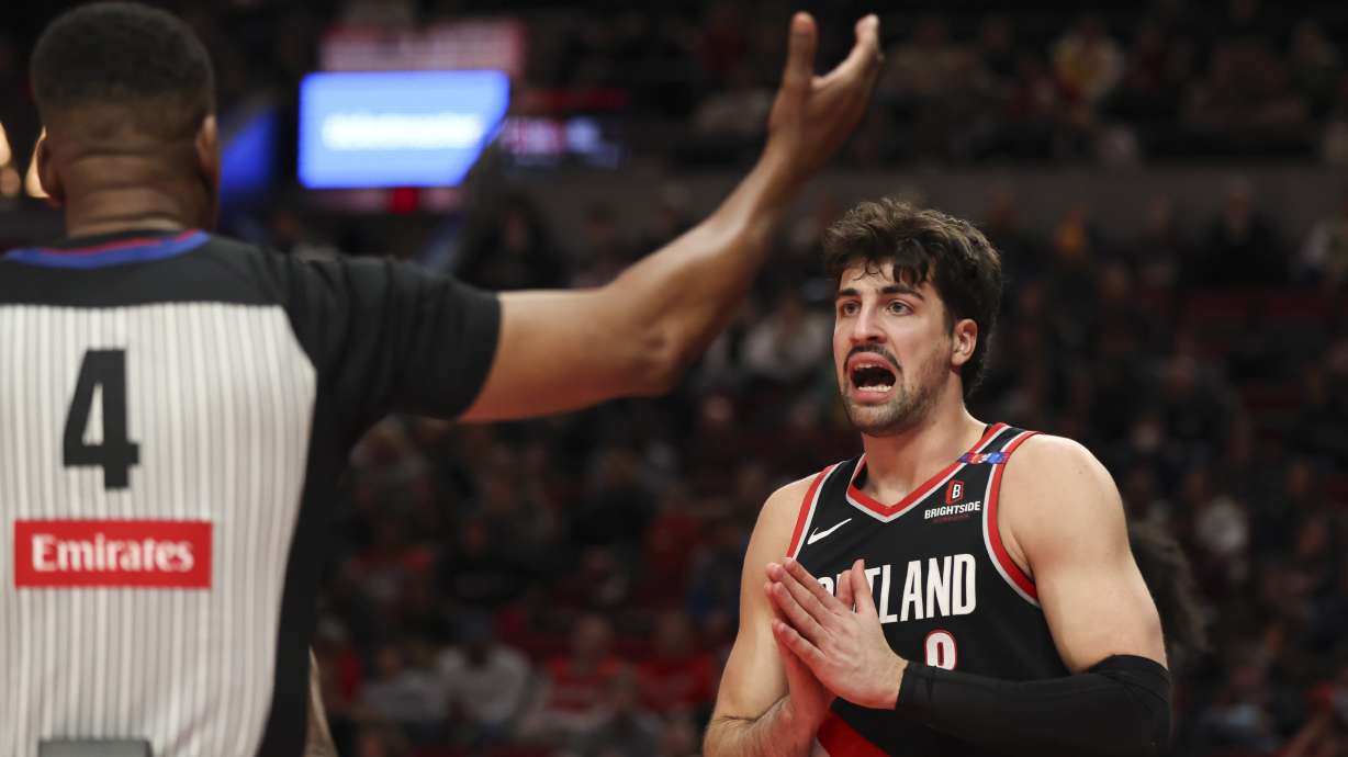 Portland Trail Blazers forward Deni Avdija, right, argues a call during the first half of an NBA basketball game against the Chicago Bulls, Sunday, Jan. 19, 2025, in Portland, Ore.