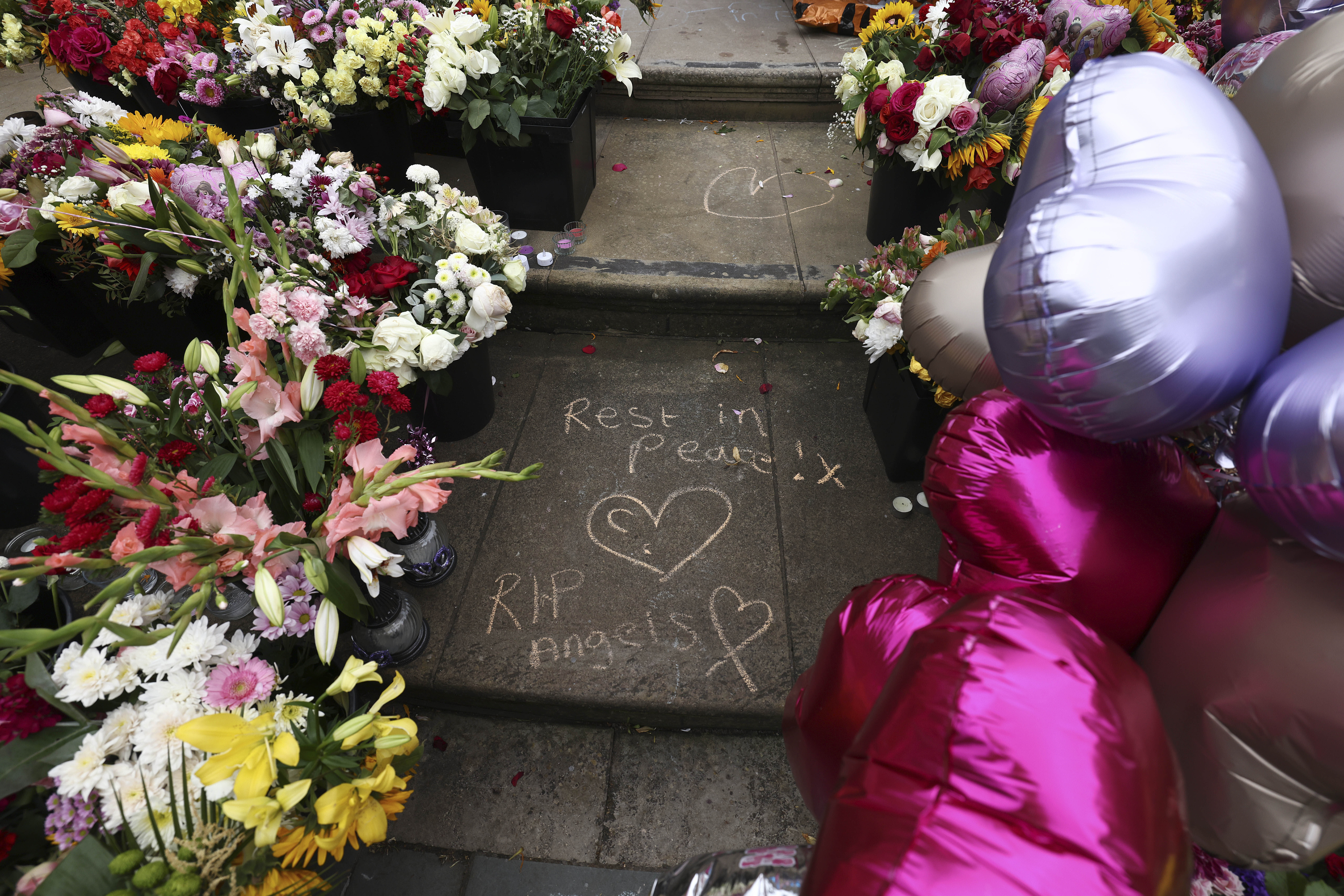 Tributes outside the Town Hall in Southport, England, Aug. 5, 2024, after three young girls were killed in a knife attack at a Taylor Swift-themed holiday club the week before. A teen has pleaded guilty to murdering three girls and wounding 10.