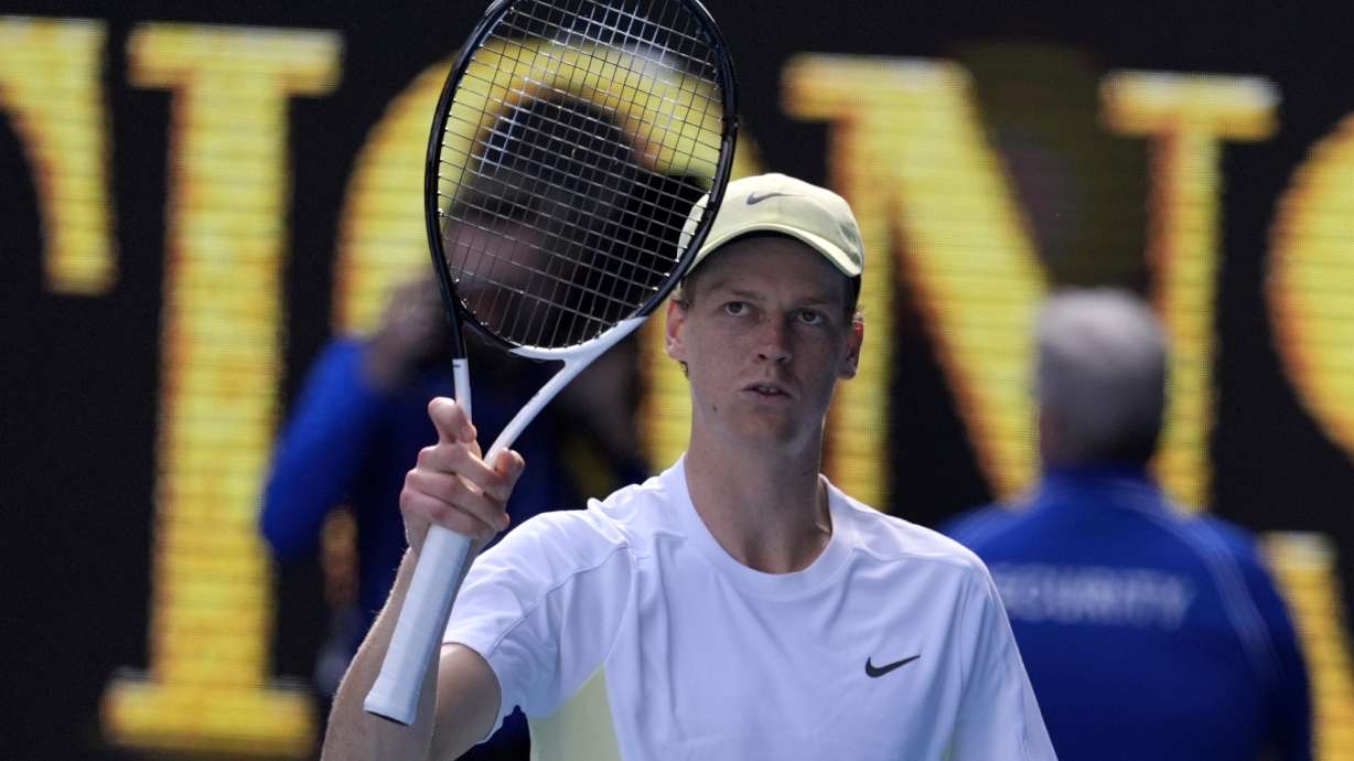 Jannik Sinner of Italy celebrates after defeating Holger Rune of Denmark in their fourth round match at the Australian Open tennis championship in Melbourne, Australia, Monday, Jan. 20, 2025.