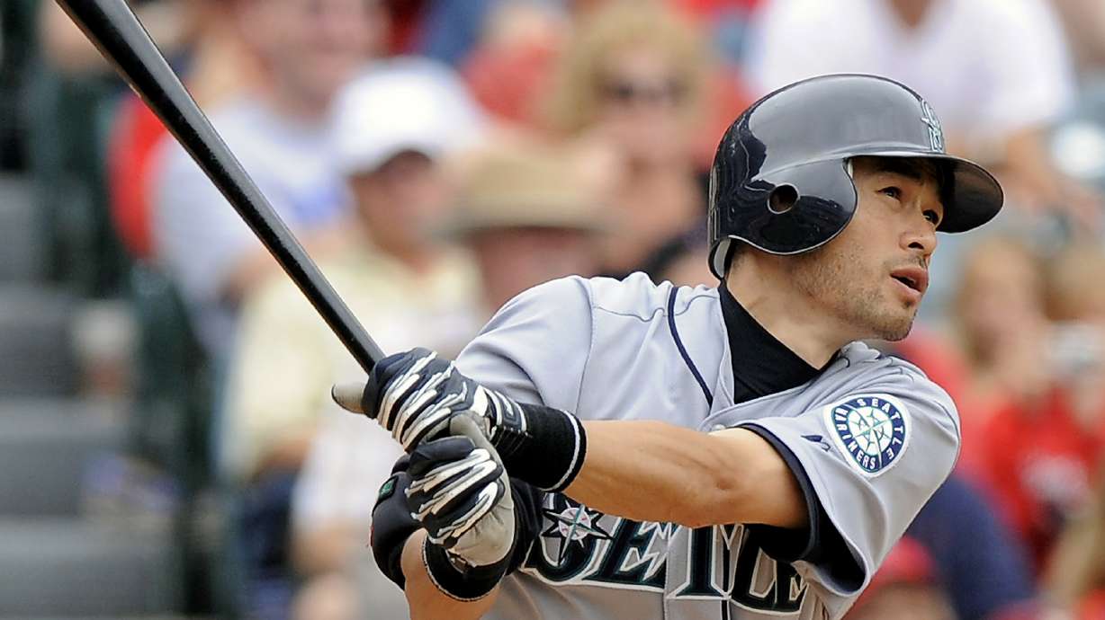 FILE - Seattle Mariners' Ichiro Suzuki, of Japan, hits a solo home run during the sixth inning of a baseball game against the Los Angeles Angels, Sunday, May 31, 2009, in Anaheim, Calif.