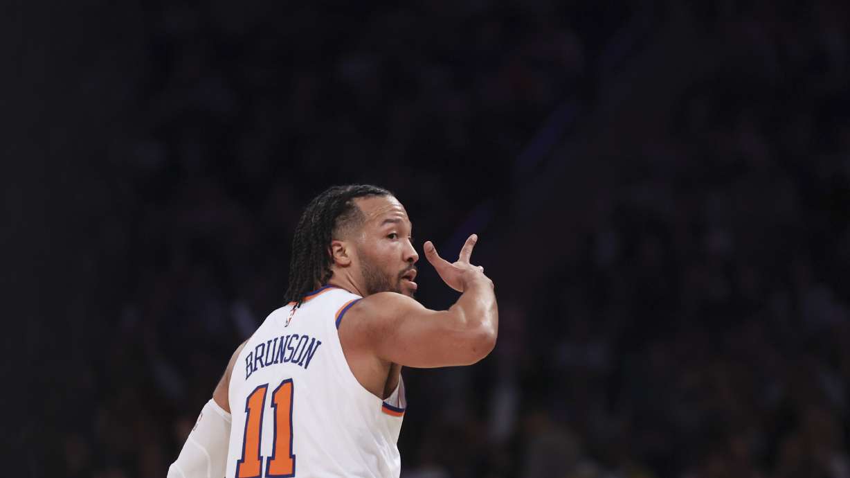 New York Knicks' Jalen Brunson celebrates after a 3-point basket during the first half of an NBA basketball game against the Atlanta Hawks, Monday, Jan. 20, 2025, in New York.
