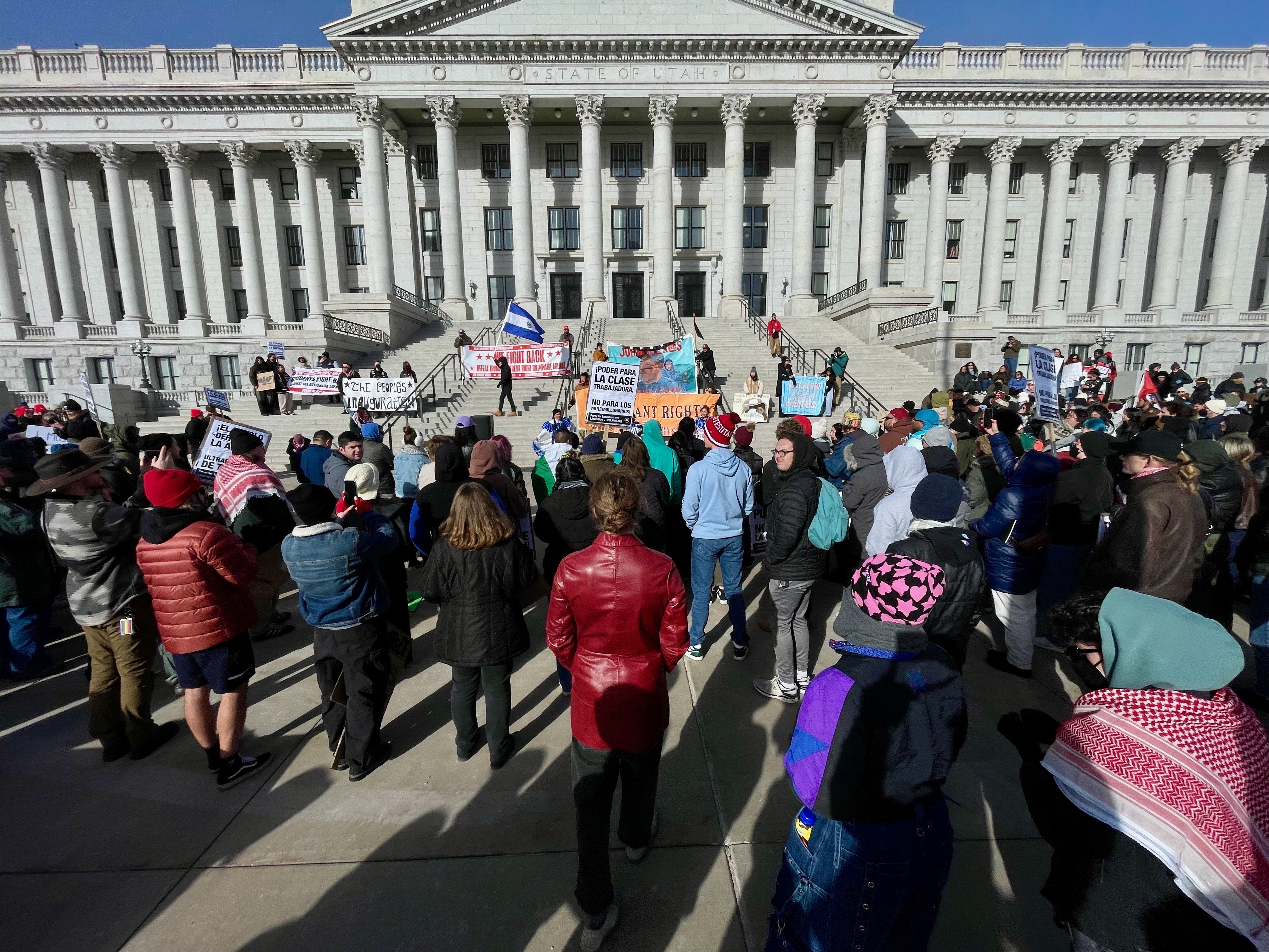 Demonstrators gathered at the Utah Capitol in Salt Lake City on Monday to protest the new administration of President Donald Trump hours after his inauguration.