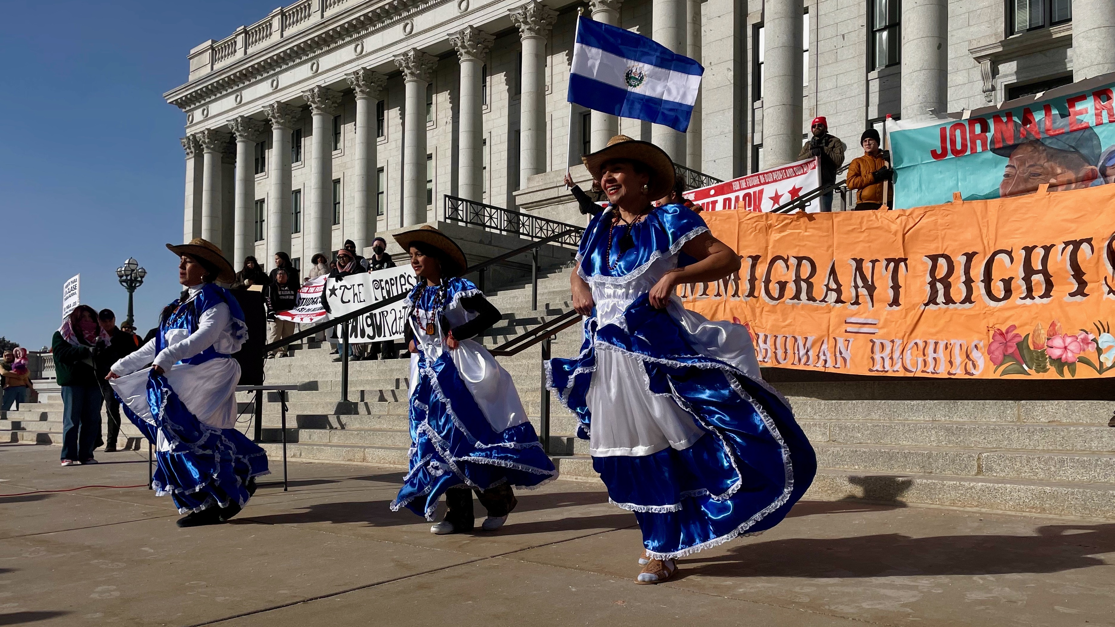 A Salvadoran dance group performs at a demonstration at the Utah Capitol in Salt Lake City on Monday by foes of the new administration of President Donald Trump hours after his inauguration.