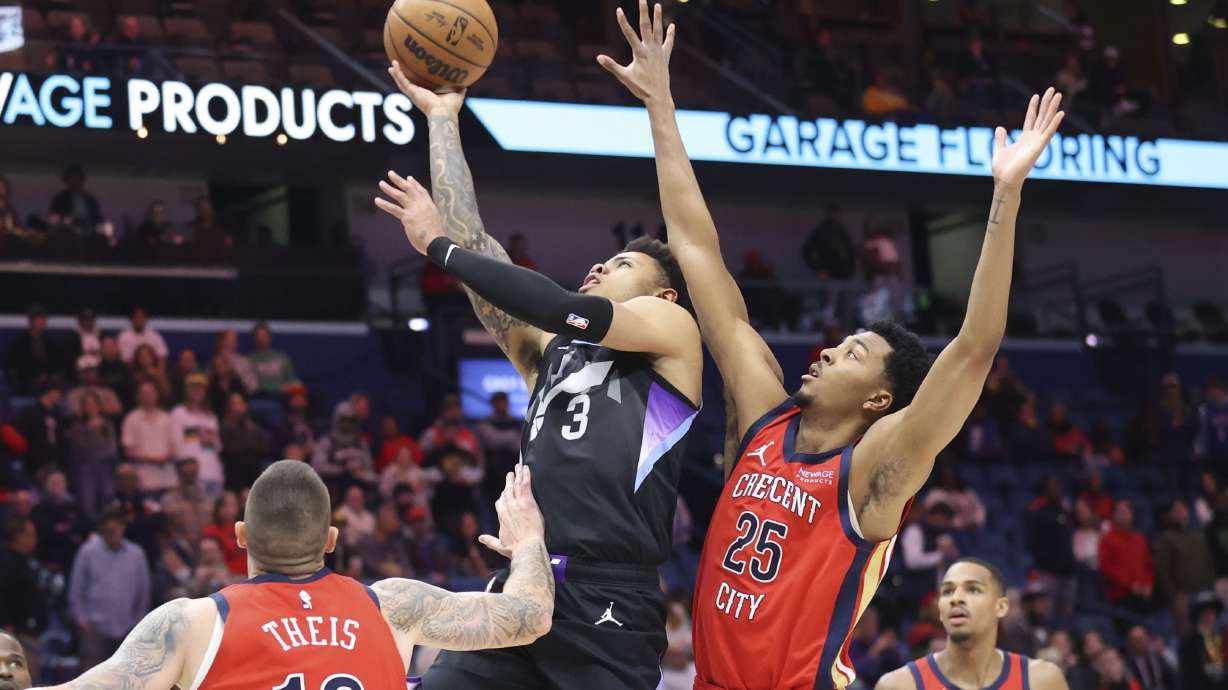 Utah Jazz guard Keyonte George (3) shoots a layup against New Orleans Pelicans guard Trey Murphy III (25) in the first half of an NBA basketball game in New Orleans, Monday, Jan. 20, 2025.