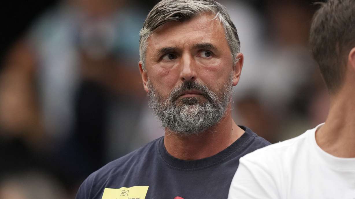 FILE- Goran Ivanisevic watches the men's singles semifinal match between Italy's Jannik Sinner and Serbia's Novak Djokovic on day twelve of the Wimbledon tennis championships in London, Friday, July 14, 2023.