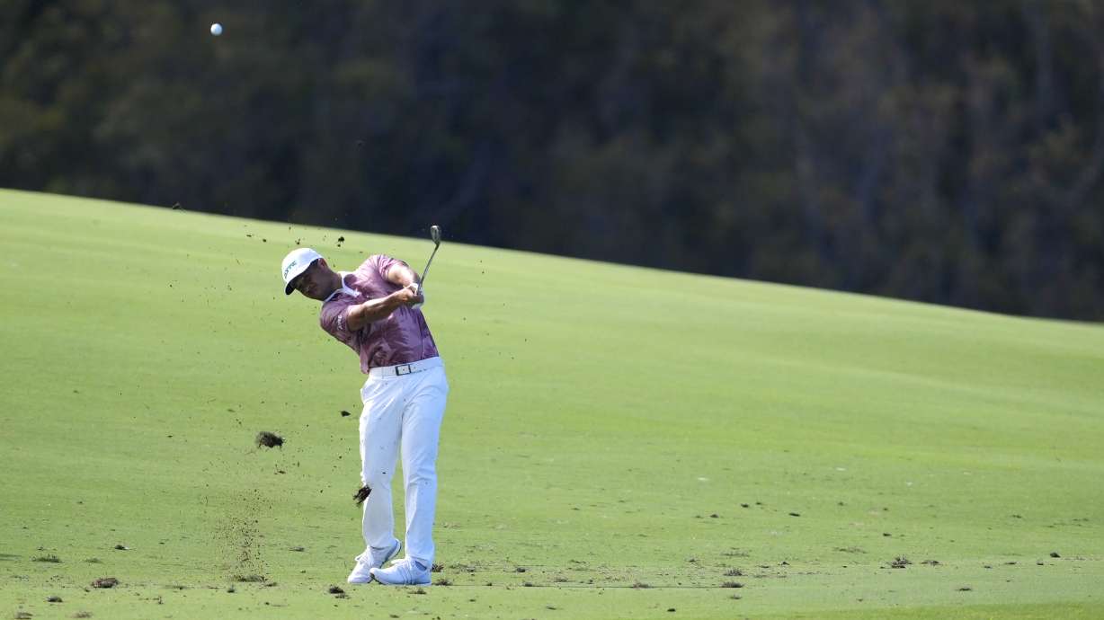 Xander Schauffele hits from the fairway at the 10th hole during the second round of The Sentry golf event, Friday, Jan. 3, 2025, at the Kapalua Plantation Course in Kapalua, Hawaii.