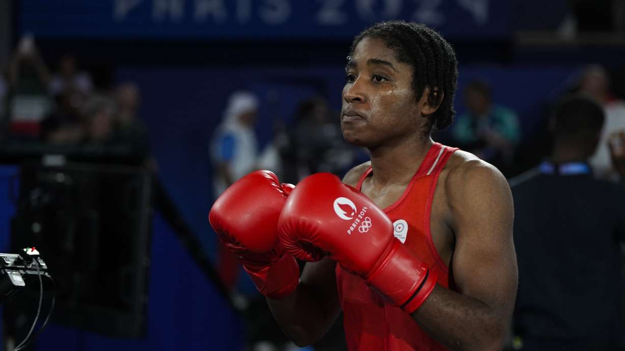 FILE - Refugee Olympic Team's Cindy Ngamba prepares to fight Panama's Atheyna Bylon in their women's 75 kg semifinal boxing match at the 2024 Summer Olympics, Thursday, Aug. 8, 2024, in Paris, France.