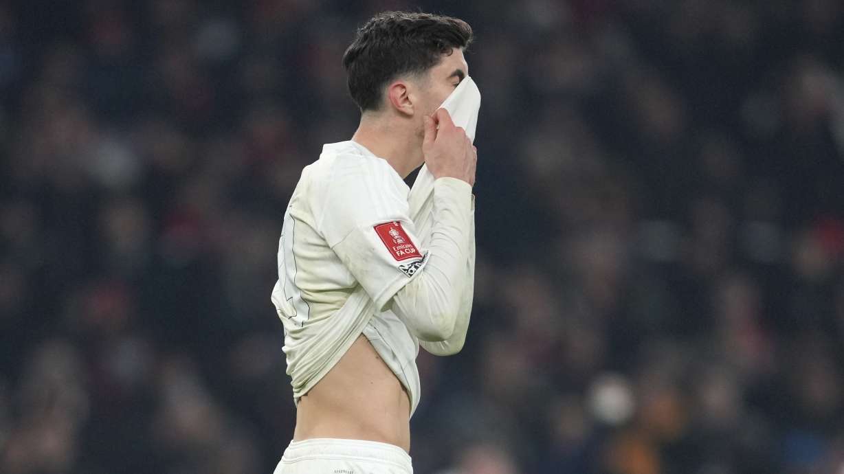 FILE - Arsenal's Kai Havertz reacts after missing a scoring chance in a penalty shootout during the English FA Cup soccer match between Arsenal and Manchester United at the Emirates stadium in London, Sunday, Jan. 12, 2025.