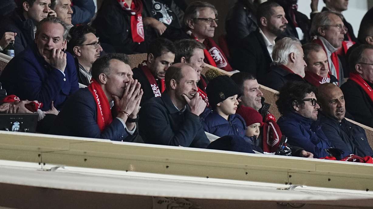 Britain's Prince William, second left, watches the Champions League opening phase soccer match between Monaco and Aston Villa at the Louis II stadium in Monaco, Tuesday, Jan. 21, 2025.