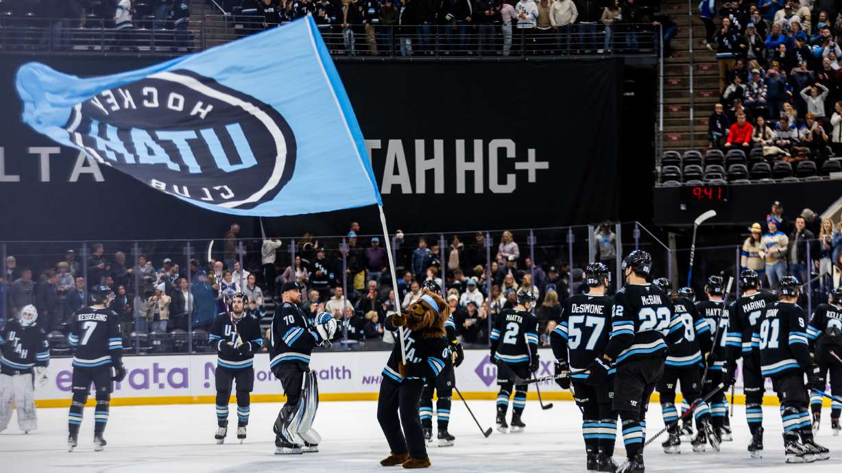 Utah Hockey Club players celebrate after winning 4-2 against the St. Louis Blues during an NHL game held at the Delta Center in Salt Lake City on Saturday, Jan. 18, 2025.