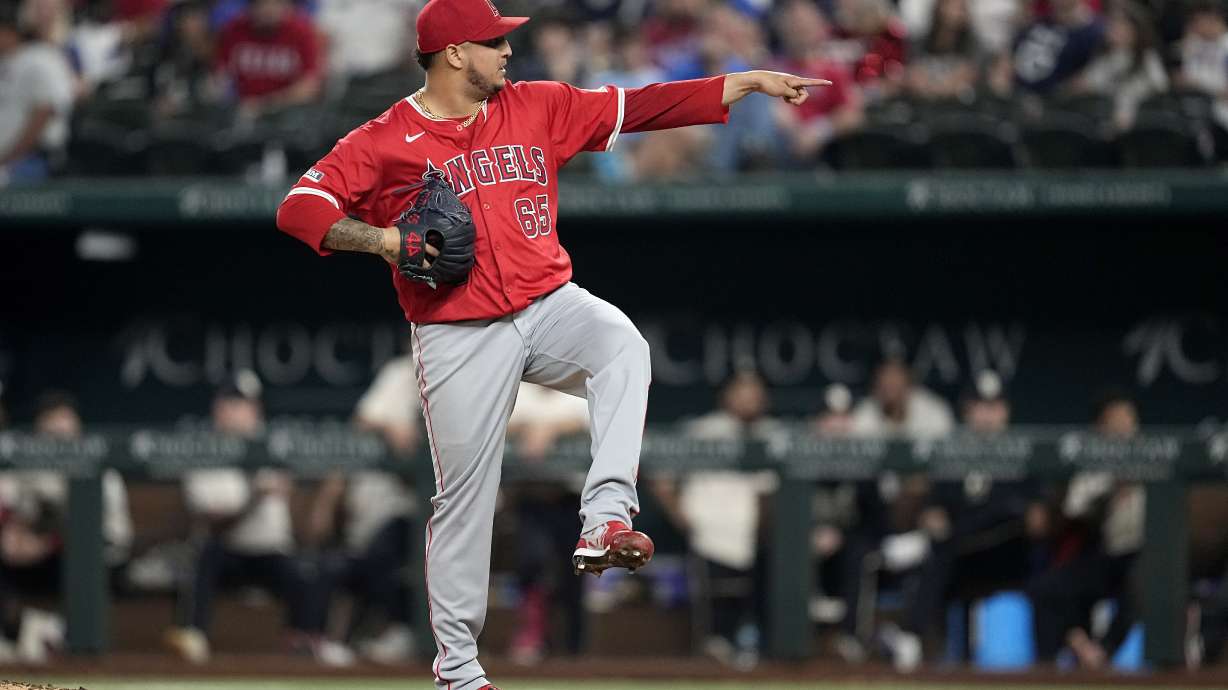 Los Angeles Angels reliever Jose Quijada points to the plate after delivering a pitch to Texas Rangers' Nathaniel Lowe in the ninth inning of a baseball game Friday, Sept. 6, 2024, in Arlington, Texas.