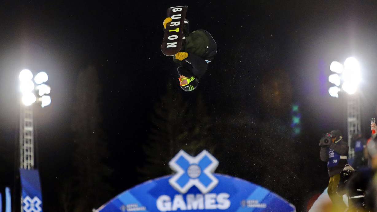 FILE - Ayumu Hirano, of Japan, flies through the air during his first run in the men's snowboard superpipe finals at the Winter X Games, Sunday, Jan. 28, in Aspen, Colo.