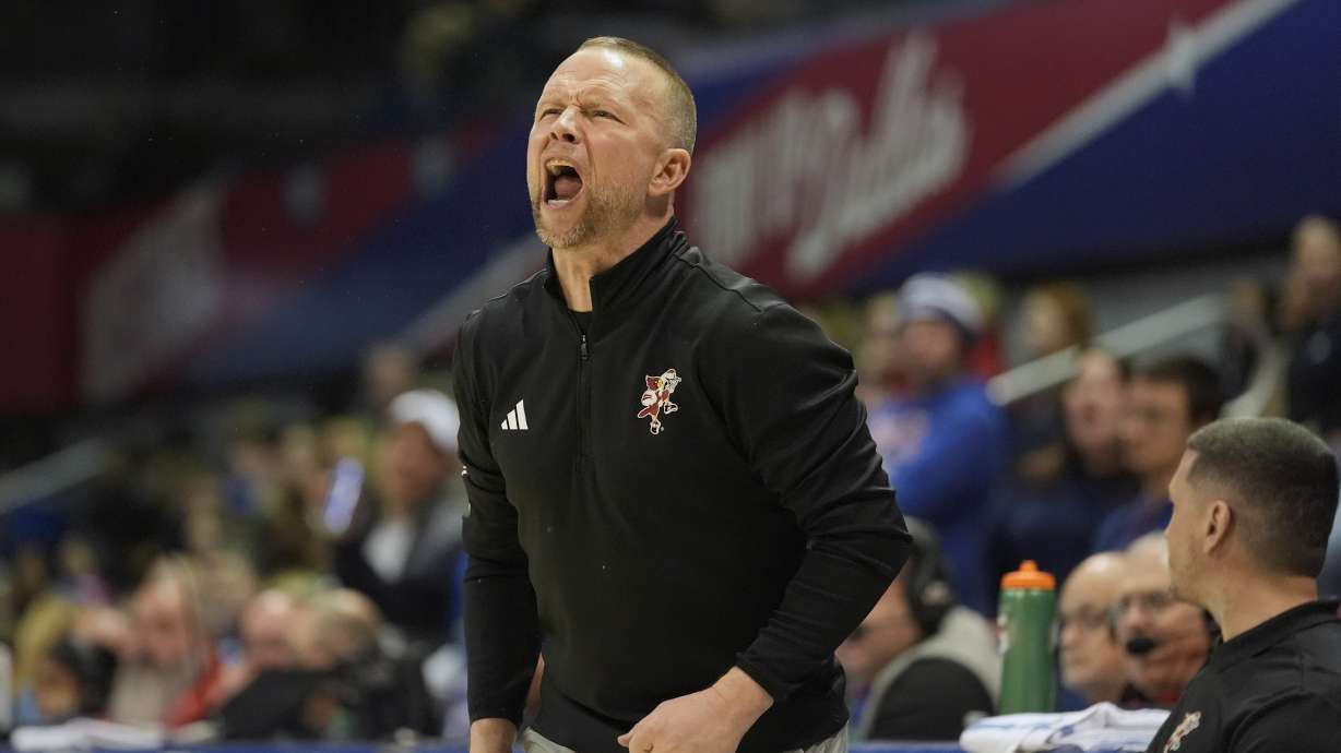 Louisville head coach Pat Kelsey yells from the sideline during the second half of an NCAA college basketball game against SMU, Tuesday, Jan. 21, 2025, in Dallas.